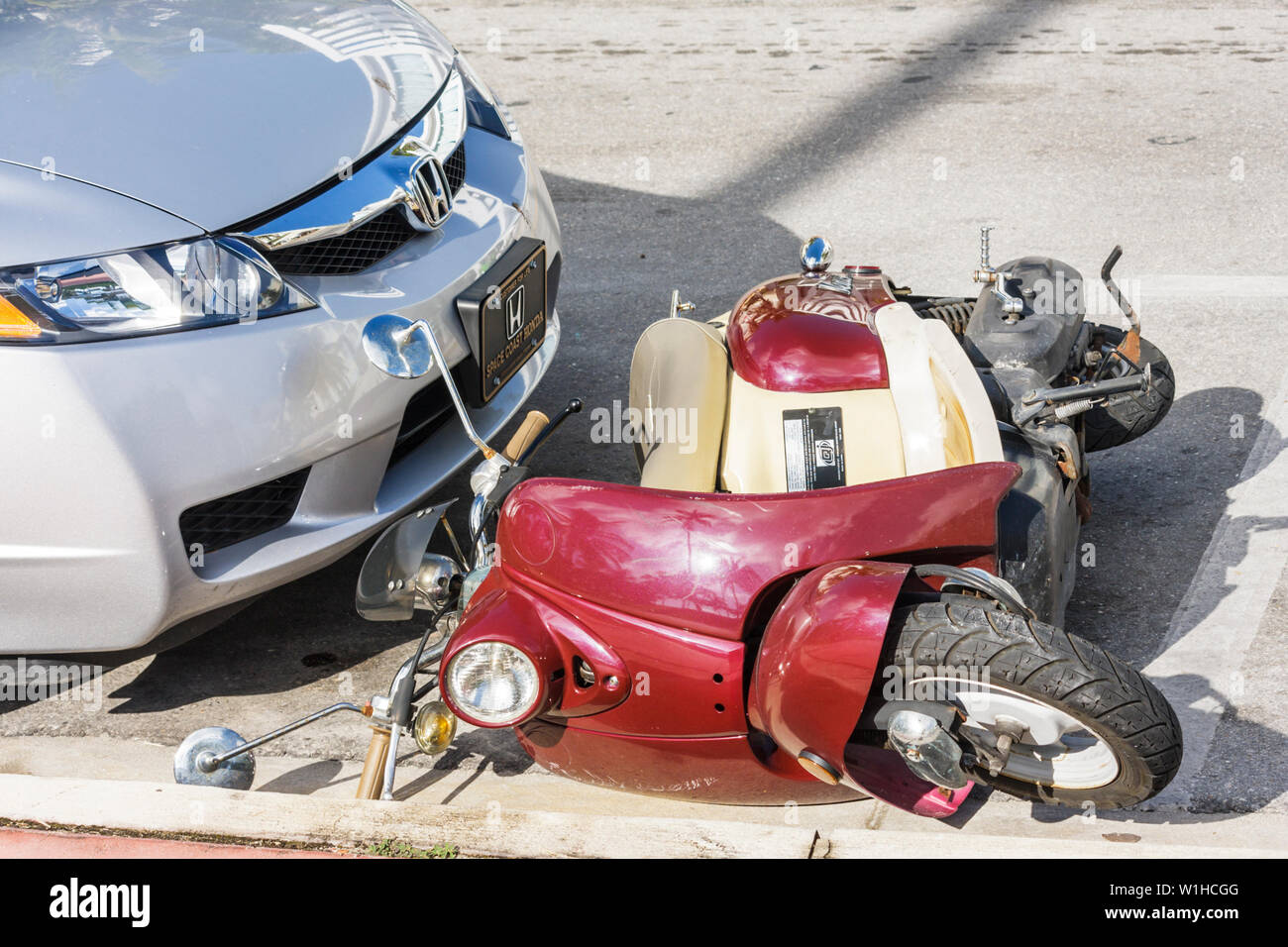 Miami Beach Florida,Ocean Drive,car,scooter,parking,knocked down,fall,damage,accident,FL091008112 Stock Photo