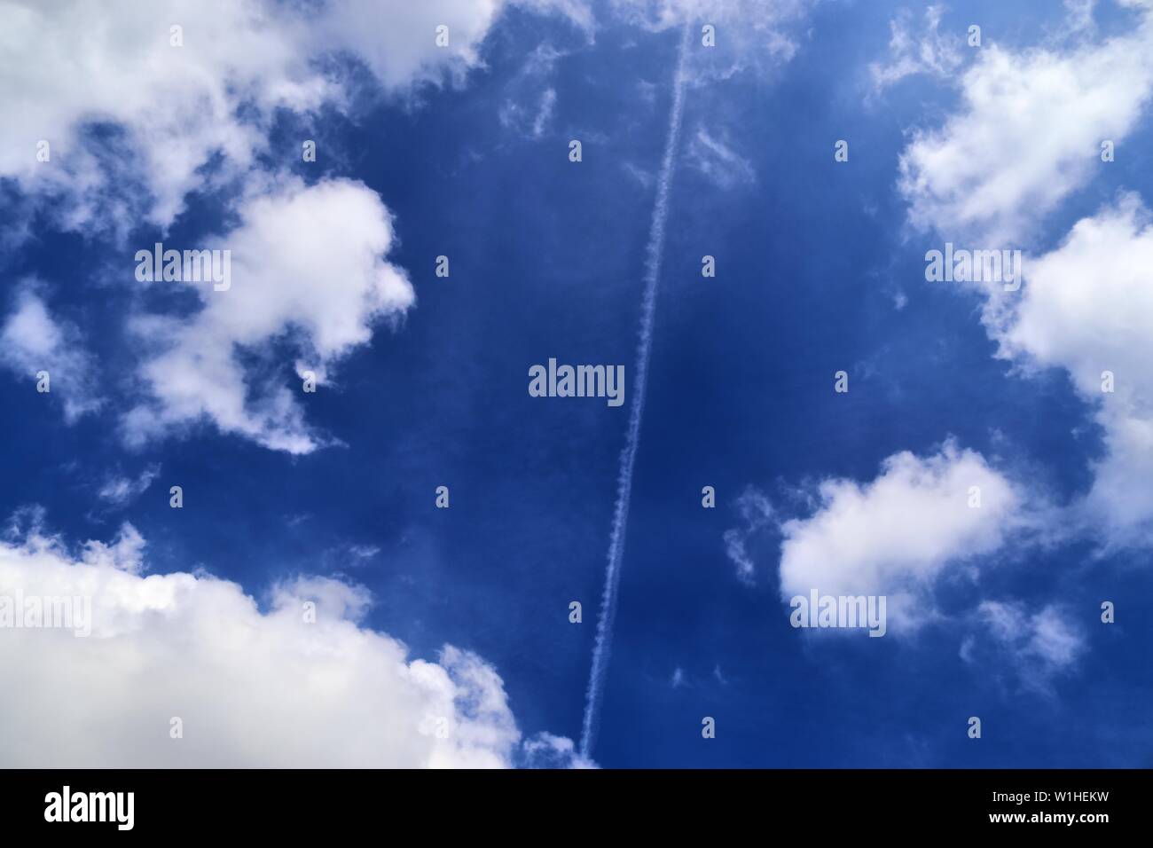Airplane flying on deep blue hi-res stock photography and images - Alamy