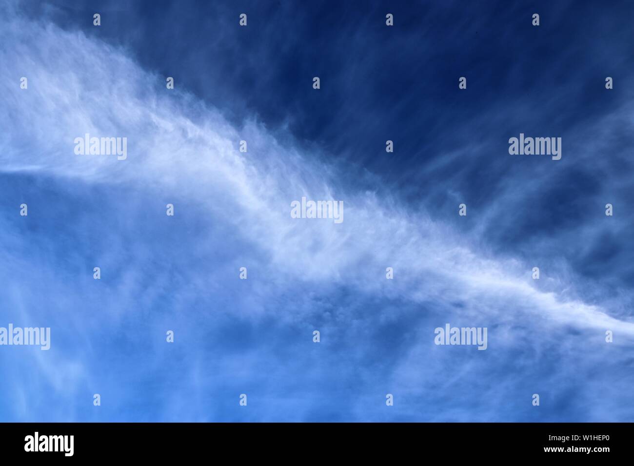 Airplane flying on deep blue hi-res stock photography and images - Alamy