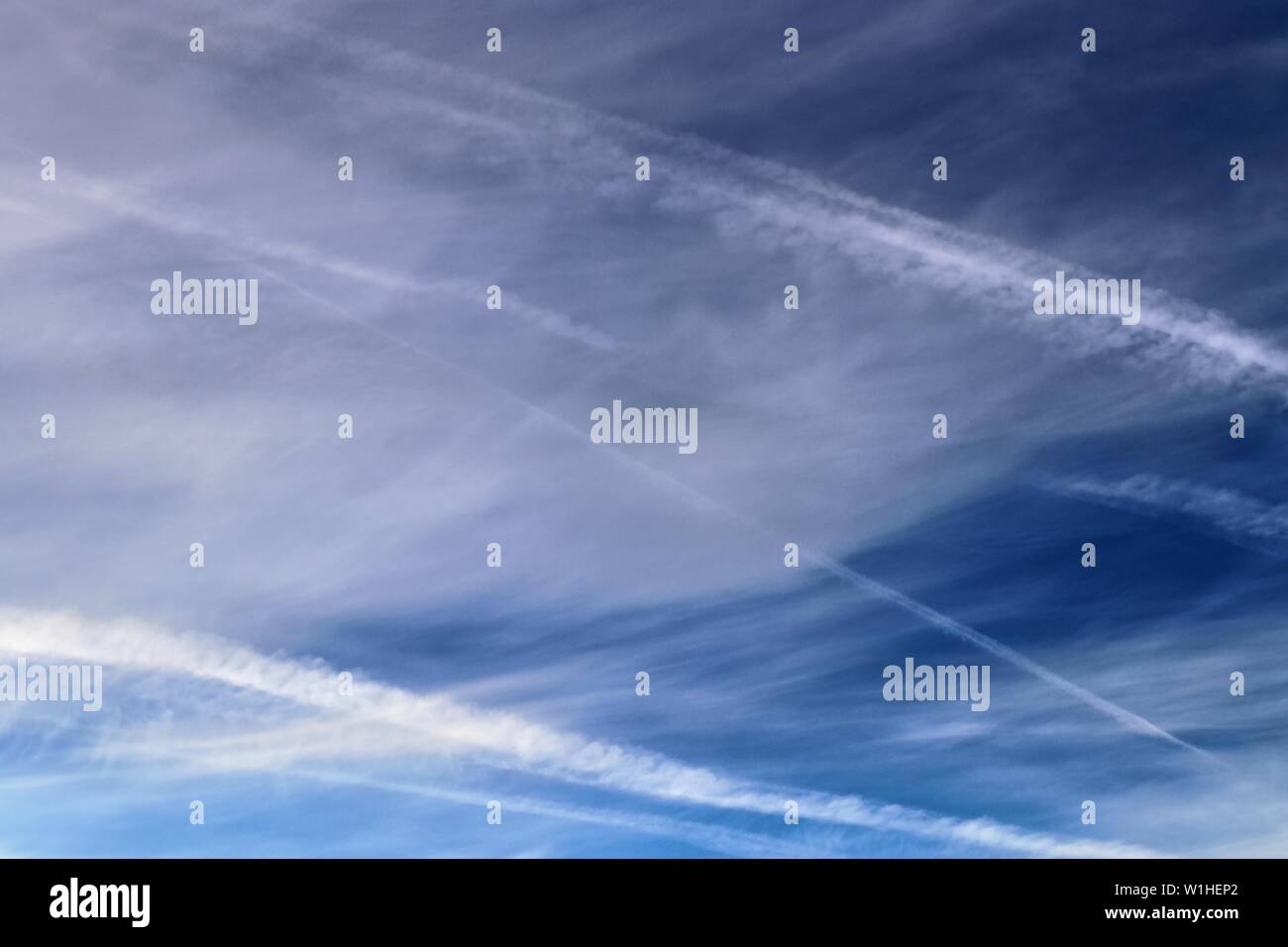 Airplane flying on deep blue hi-res stock photography and images - Alamy