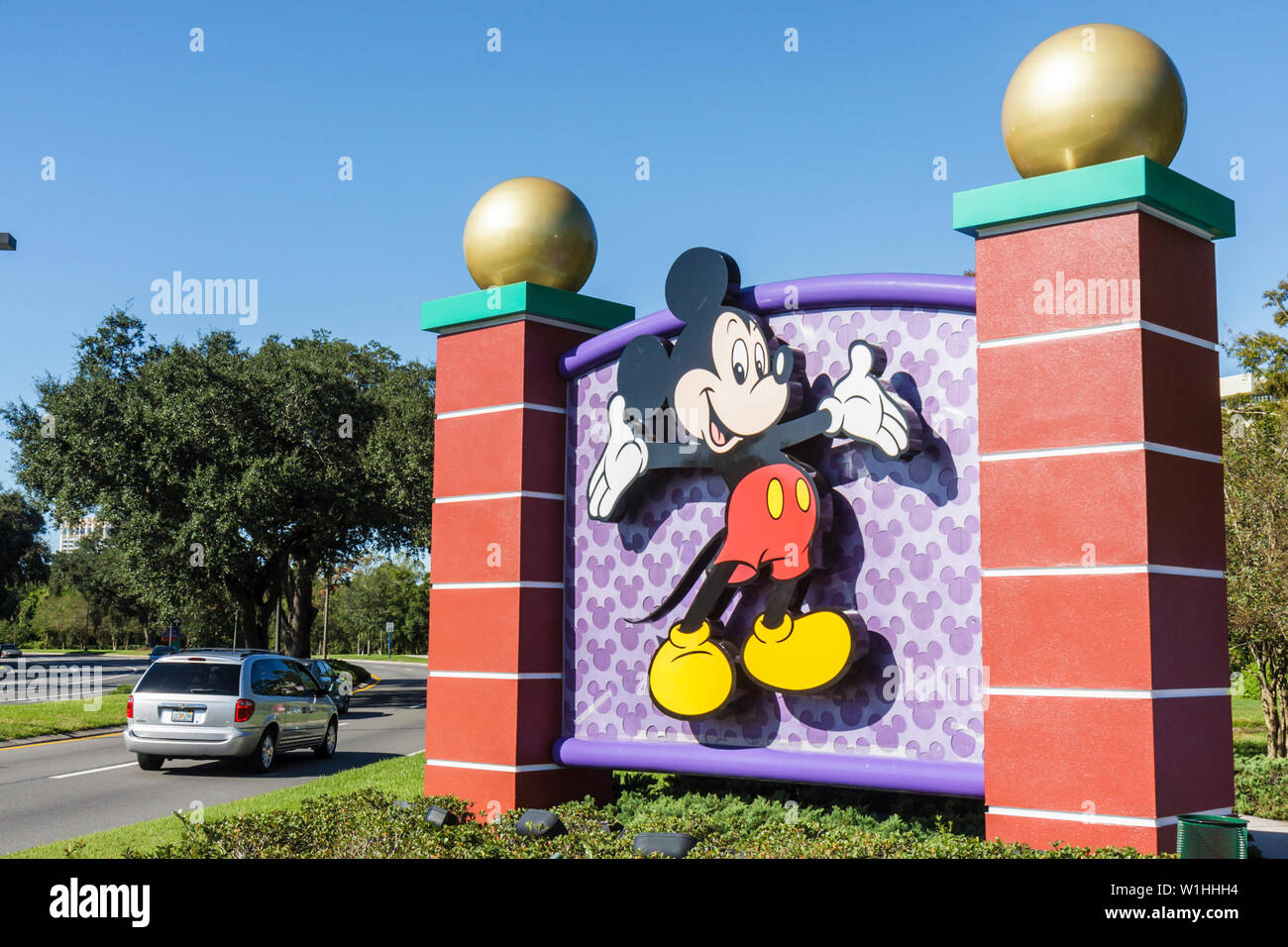 Orlando Florida,Buena Vista,Walt Disney World Resort,entrance,front,sign,logo,Mickey Mouse,cartoon character,theme park,entertainment,roadway,van,visi Stock Photo