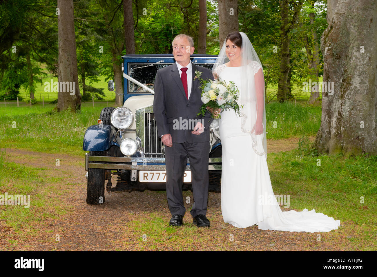A bride and her Grandfather from a Scottish wedding which took place on the Belladrum Estate, Kiltarlity, Inverness-shire. Stock Photo