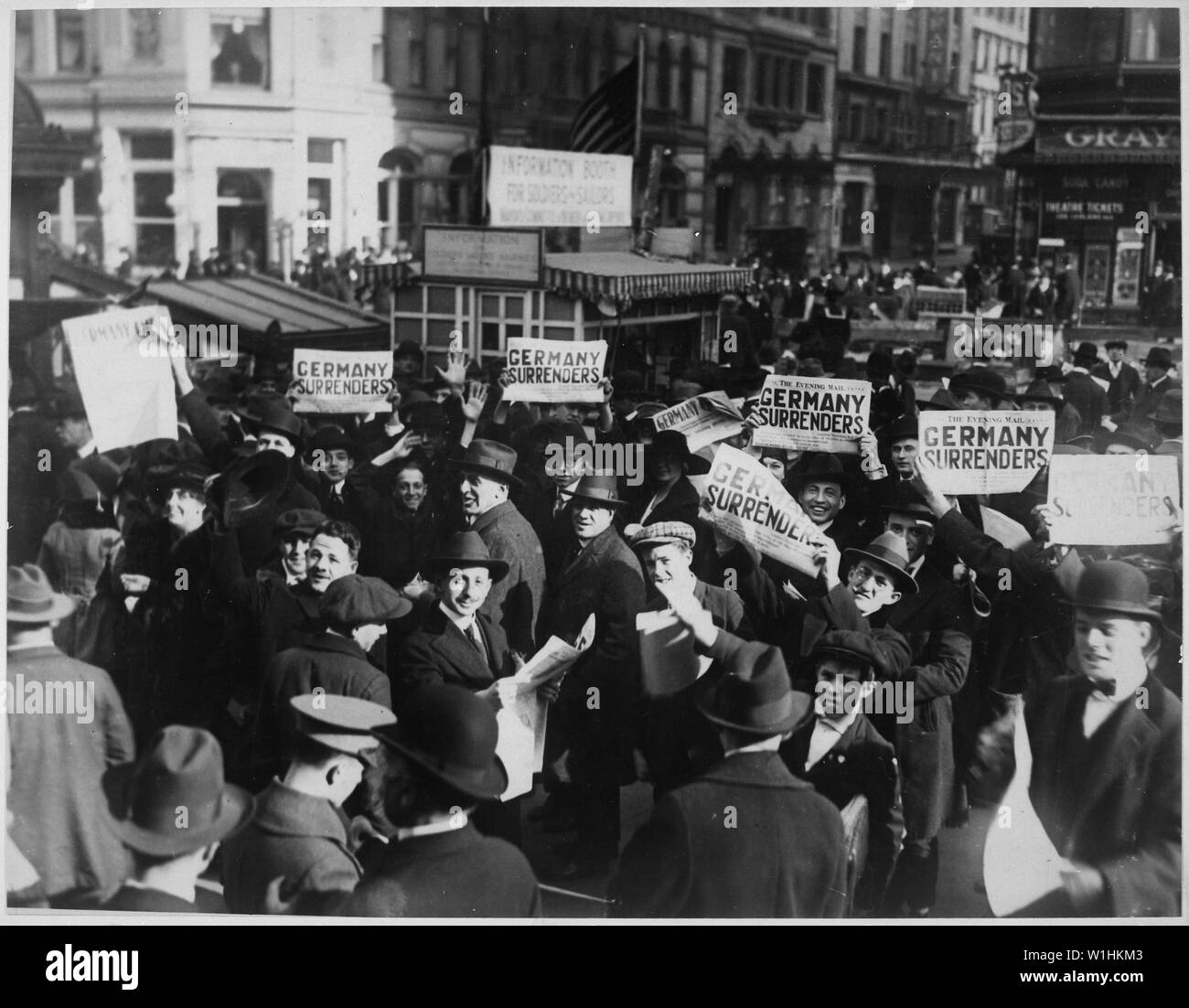 Peace rumor, New York. Crowd at Times Square holding up Extras telling about the signing of the Armistice. The Government report that the news was not true did not stop the celebration. Western Newspaper Union., 11/07/1918; General notes:  Use War and Conflict Number 710 when ordering a reproduction or requesting information about this image. Stock Photo