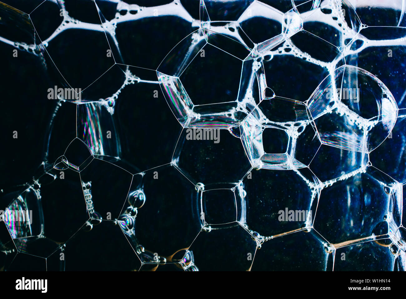Oil bubbles inside water base form patterns Stock Photo - Alamy