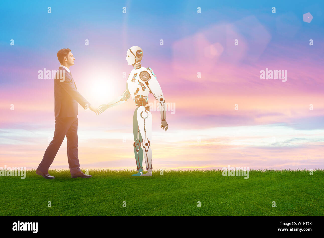 Concept Of Cooperation Between Humans And Robots Stock Photo - Alamy