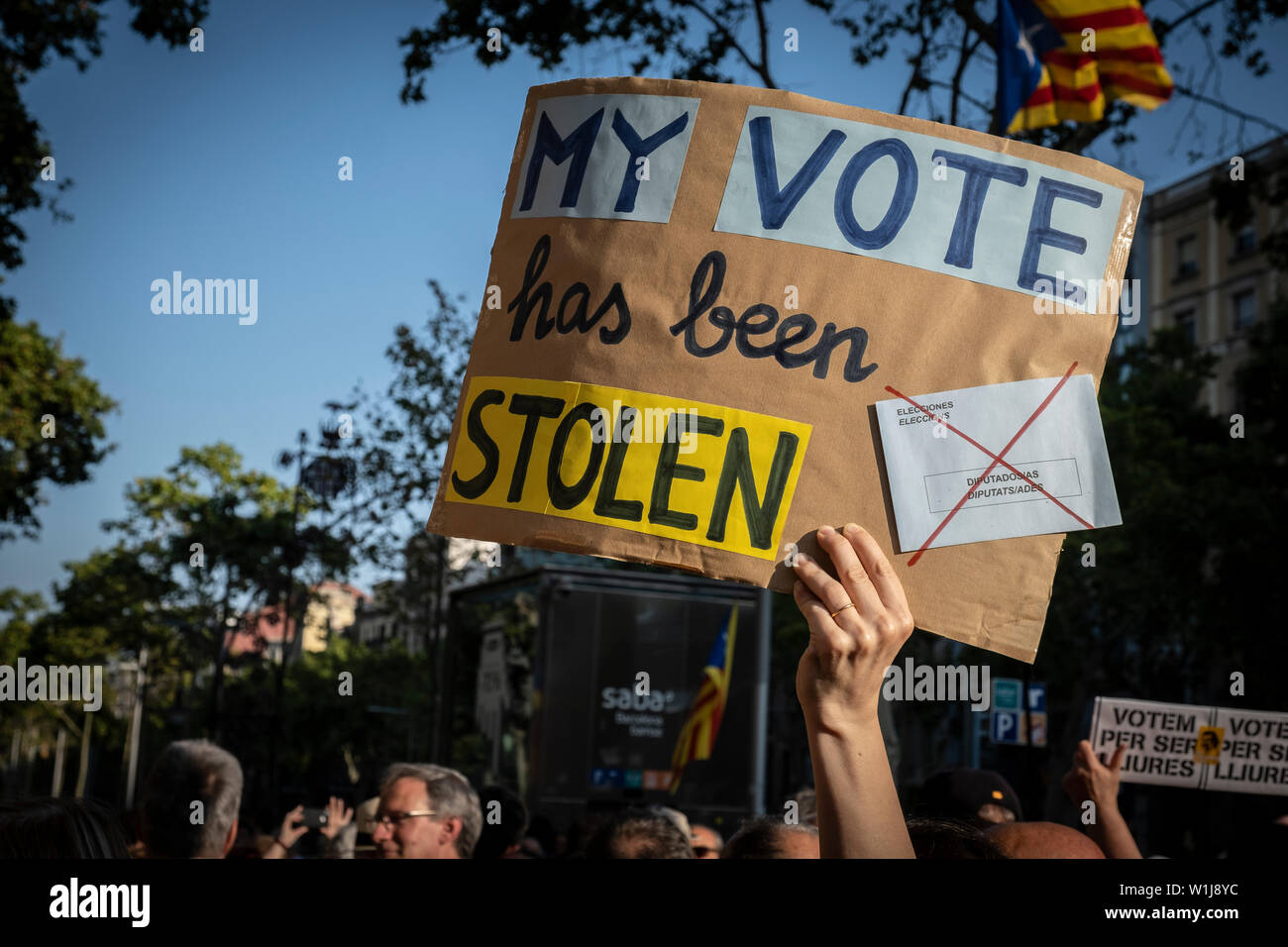 Barcelona, Spain. 02nd July, 2019. A protester holds a placard saying My vote has been stolen during the demonstration.In correspondence with the rallies in front of the European Parliament in Strasbourg, hundreds of supporters for the independence of Catalonia have gathered in front of the headquarters of the European Commission in Barcelona in support of the three elected Catalan deputies to whom the Spanish authorities have prevented their recognition as European parliamentarians given their judicial status. Credit: SOPA Images Limited/Alamy Live News Stock Photo