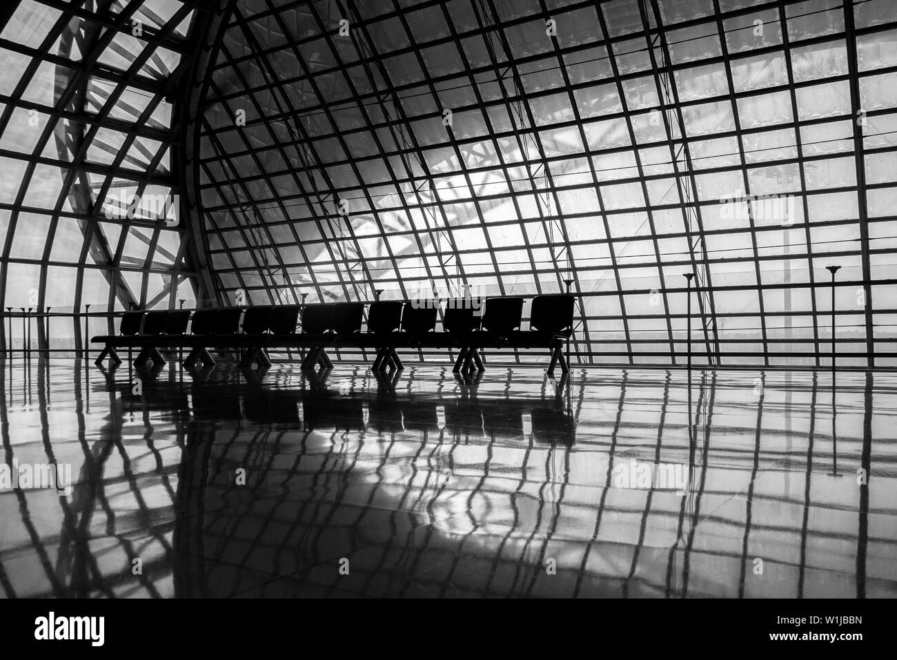 silhouette metal structure of modern building architecture and empty waiting chairs similar spaceship interior. abstract modern architecture and inter Stock Photo