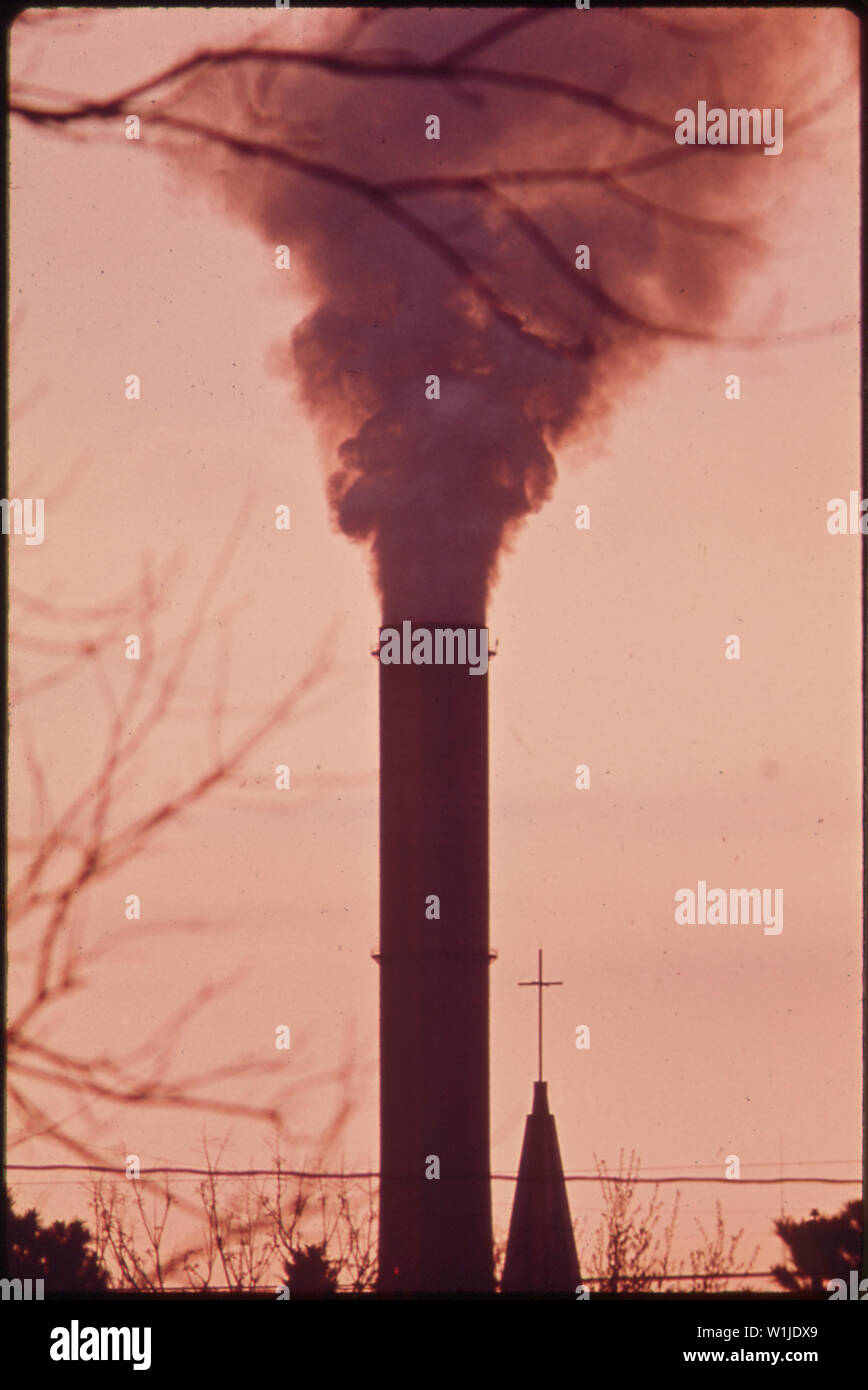 THE KAISER ALUMINUM PLANT SMOKESTACK, BEHIND THE CATHOLIC CHURCH
