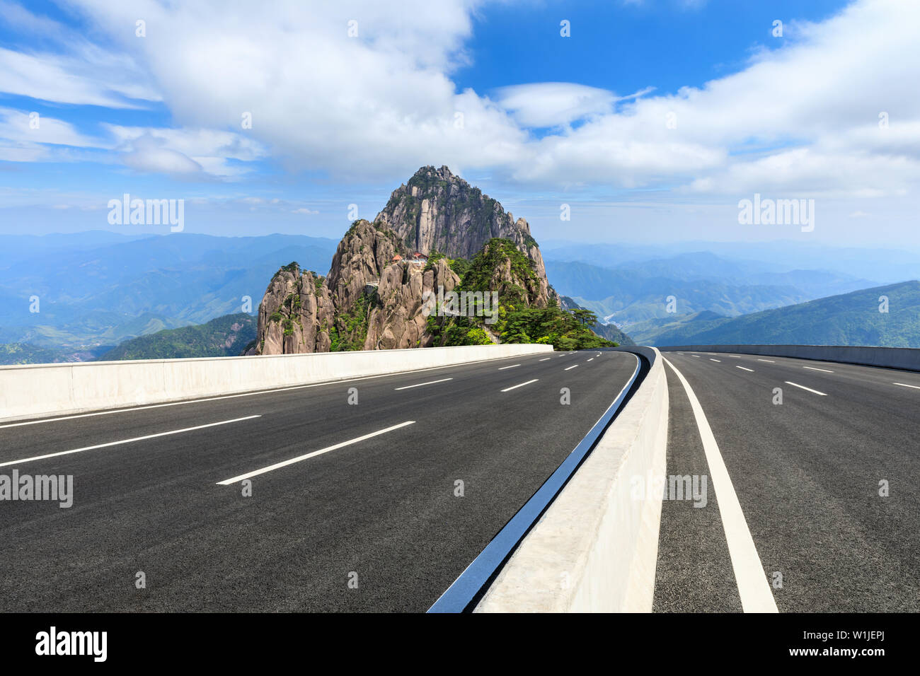 Asphalt highway and beautiful mountain nature landscape in Huangshan,Anhui,China. Stock Photo