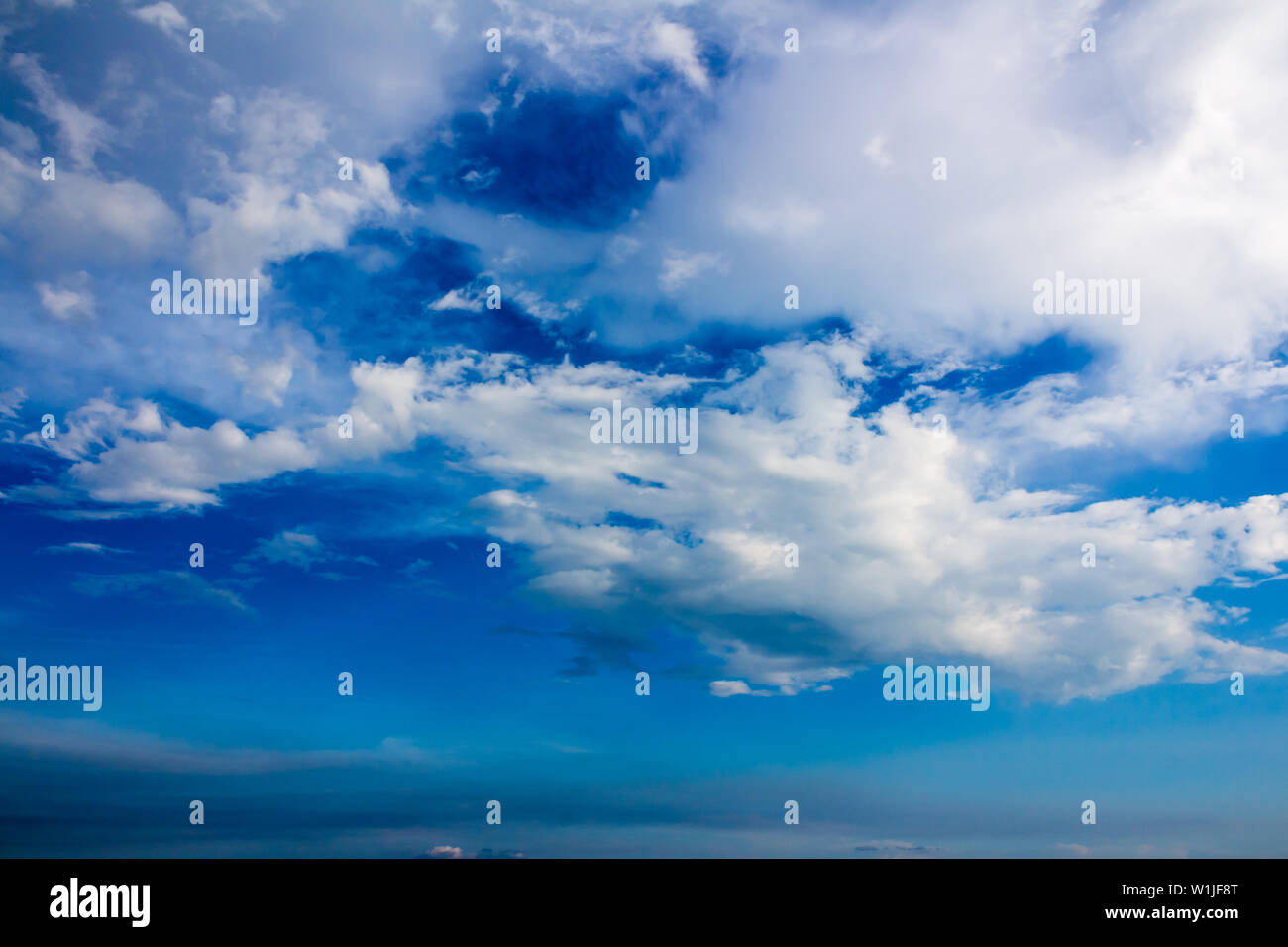 grey rain clouds in the blue sky Stock Photo - Alamy