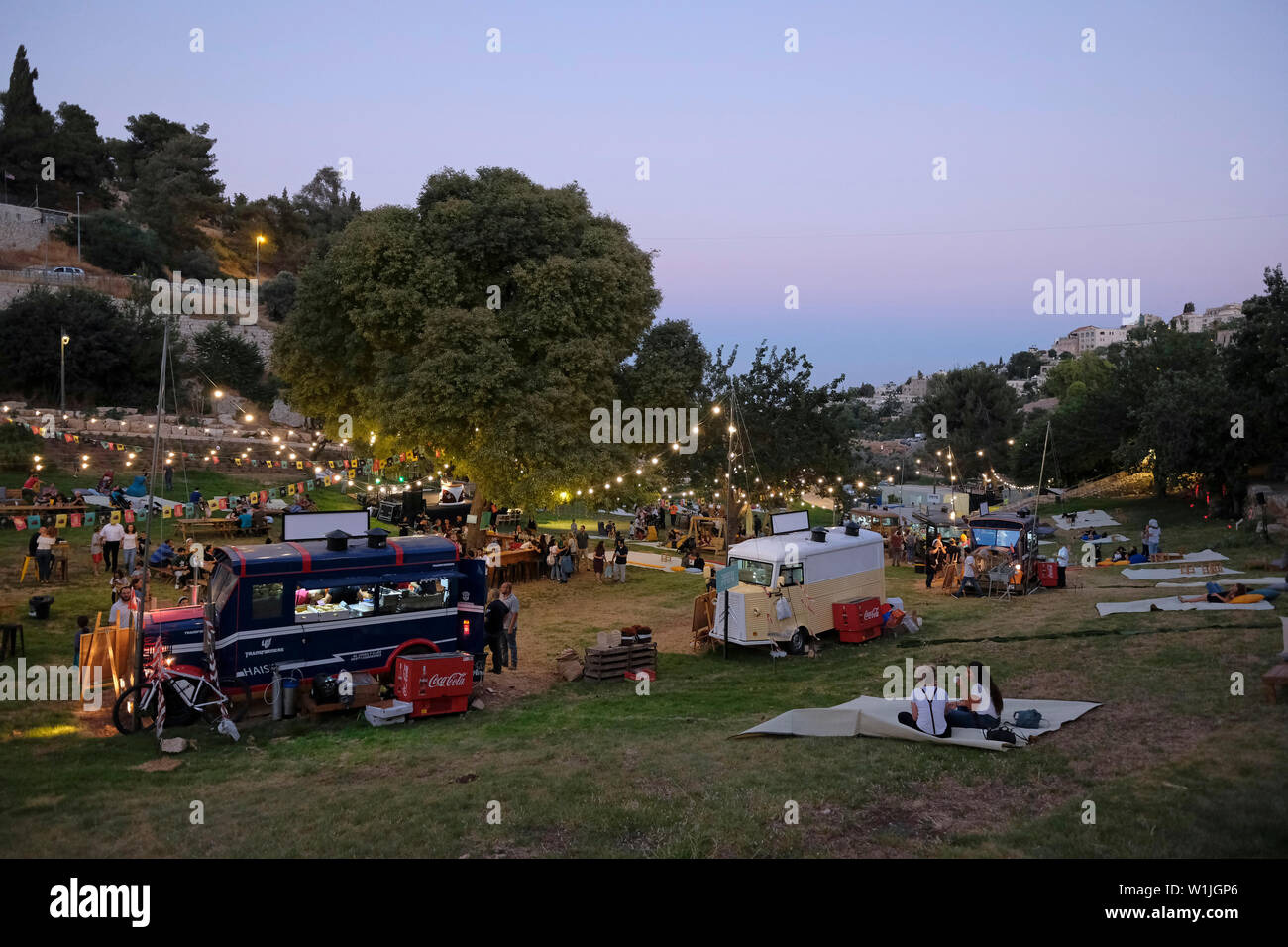 People Buying And Eating Take Away Food At The Food Truck