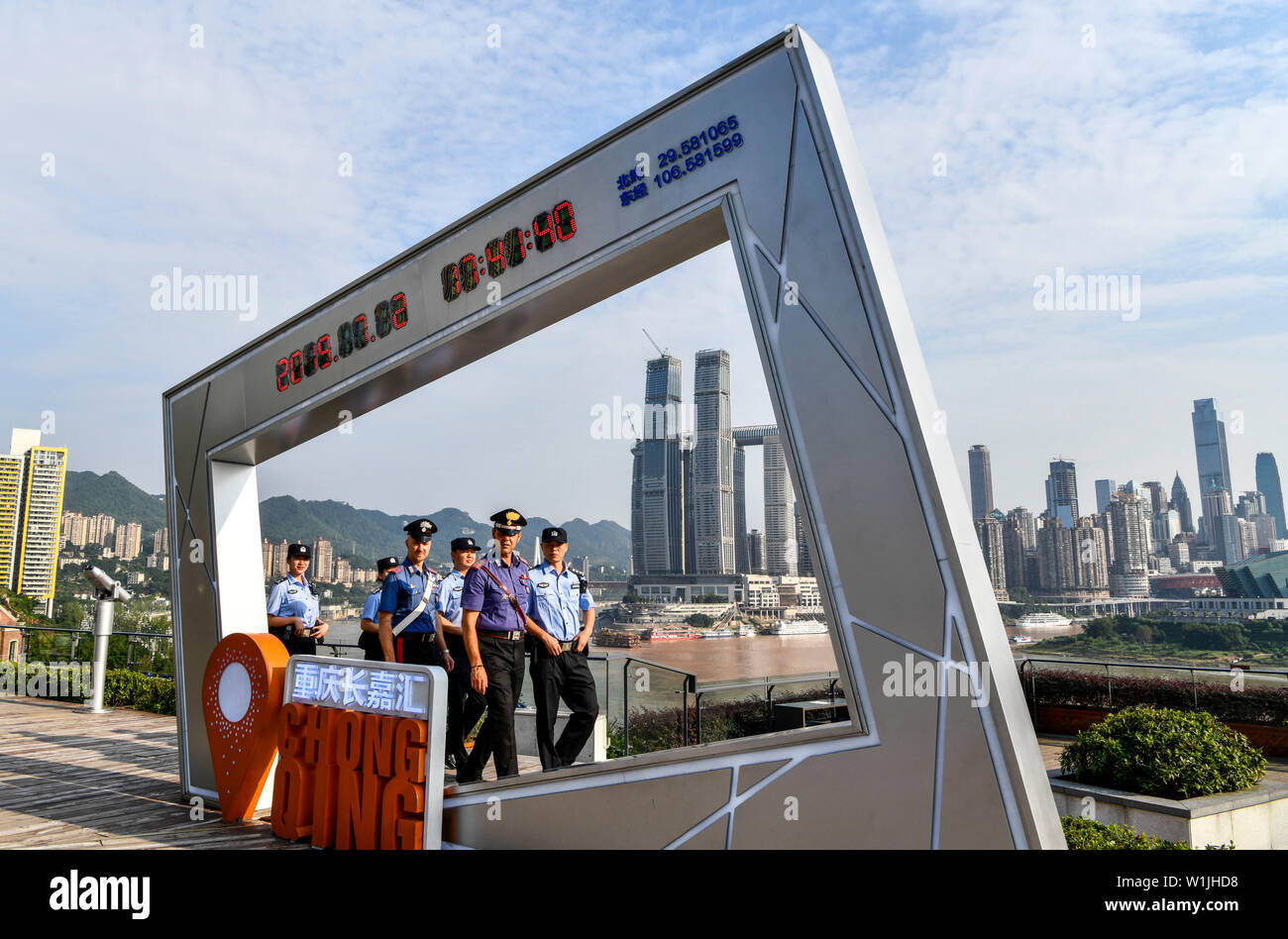 Beijing, China. 2nd July, 2019. Chinese and Italian police officers patrol in Nan'an District of southwest China's Chongqing Municipality, July 2, 2019. The police in Chongqing launched a joint patrol with their Italian counterparts on June 26, according to local police. Credit: Liu Chan/Xinhua/Alamy Live News Stock Photo