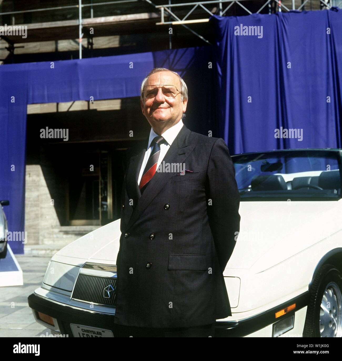 The management chairman of the American automotive group Chrysler, Lee Iacocca, taken on September 8, 1987 at the International Motor Show (IAA) in Frankfurt am Main in front of a Chrysler model. | usage worldwide Stock Photo