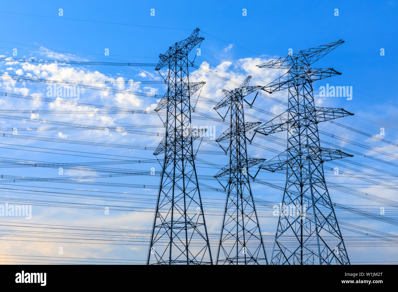 High voltage post,High voltage tower sky background Stock Photo - Alamy