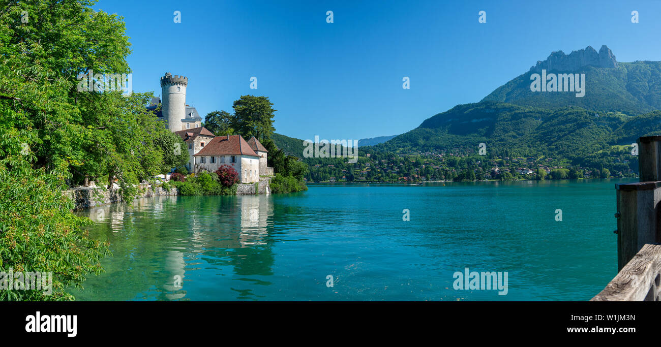 the medieval castle on Annecy lake in Alpes mountains, France Stock ...