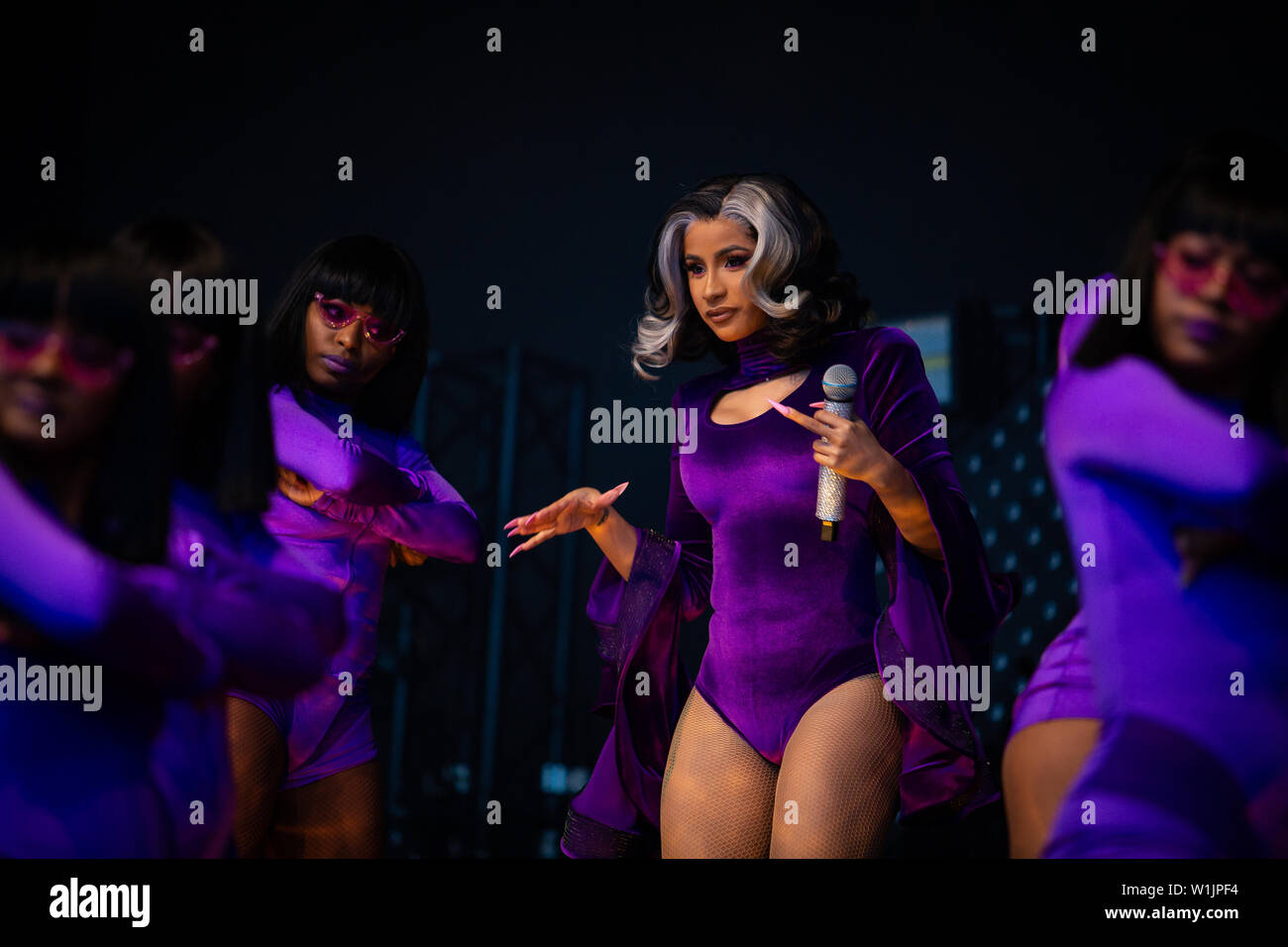 Cardi B Performs in Norway in a Black Sheer Sequin Catsuit