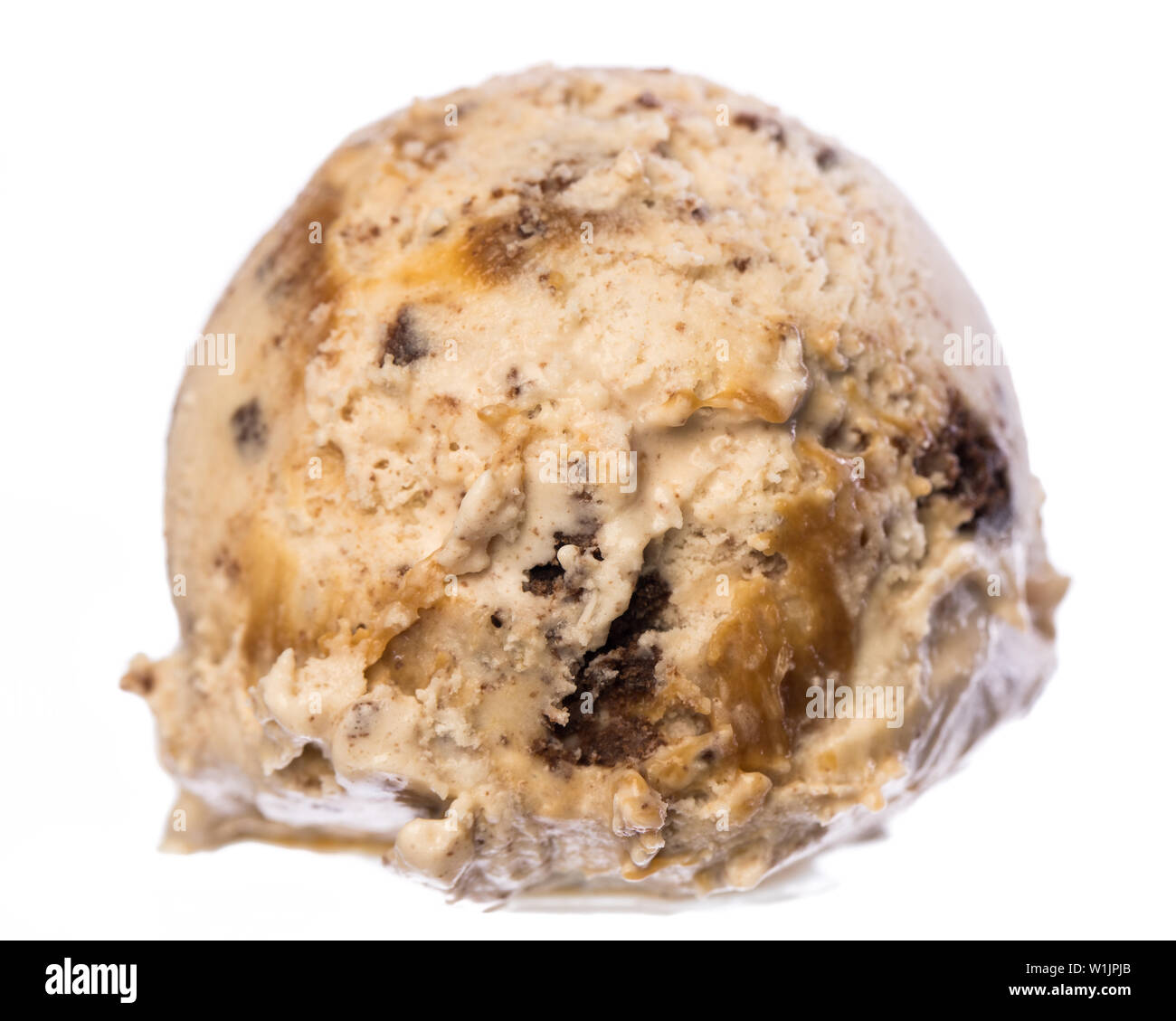 Single scoop of vanilla - caramel - brownie ice cream isolated on white background front view Stock Photo