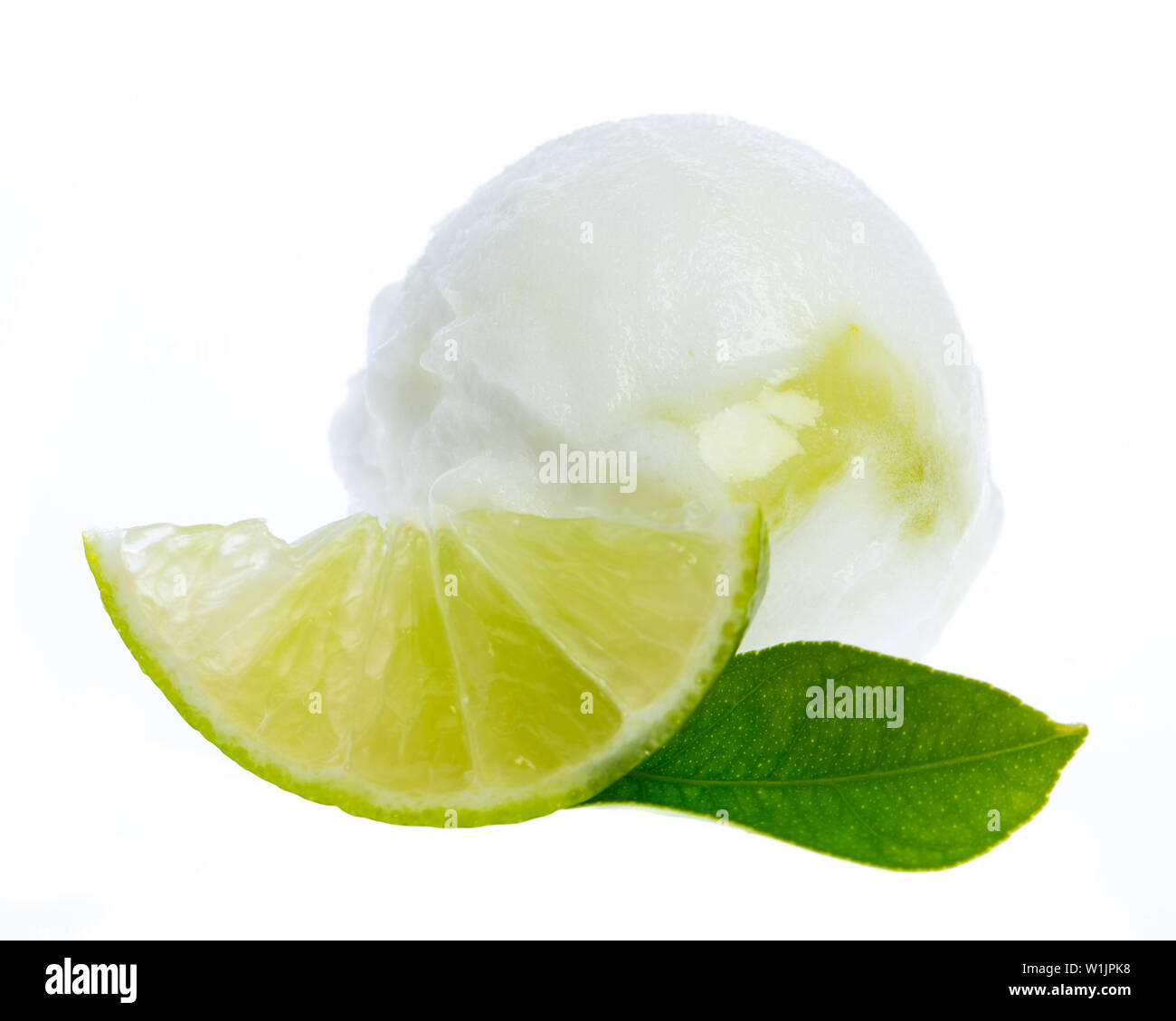 lime ice cream with lime slice and lime leaf isolated on white background Stock Photo