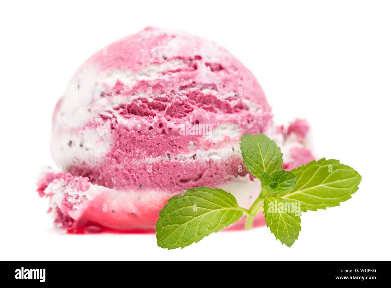 A mixed scoop of vanilla and cherry ice cream with mint isolated on white background Stock Photo