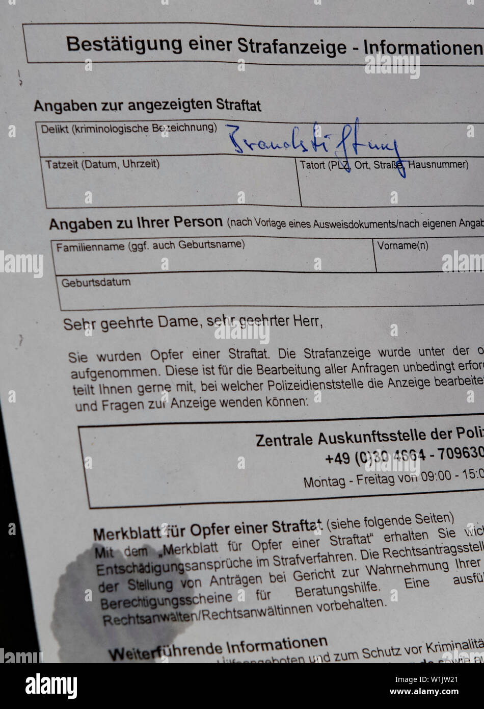 Berlin, Germany. 03rd July, 2019. The police letter is in a burnt-out car in the Hansaviertel on Bartningallee. A total of five cars were set on fire there during the night. The police are assuming arson. Last night, six vehicles were already on fire in Berlin. Credit: Paul Zinken/dpa/Alamy Live News Stock Photo