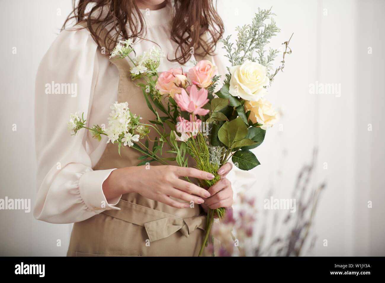 Japanese woman with flowers Stock Photo