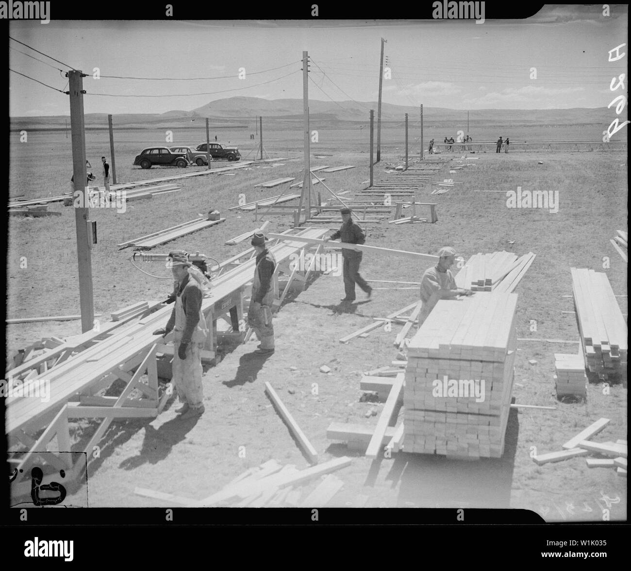 Tule Lake Relocation Center, Newell, California. Construction begins on this War Relocation Authori . . .; Scope and content:  The full caption for this photograph reads: Tule Lake Relocation Center, Newell, California. Construction begins on this War Relocation Authority center for evacuees of Japanese ancestry near Tule Lake in Modoc County, California, south of the Oregon border. Stock Photo