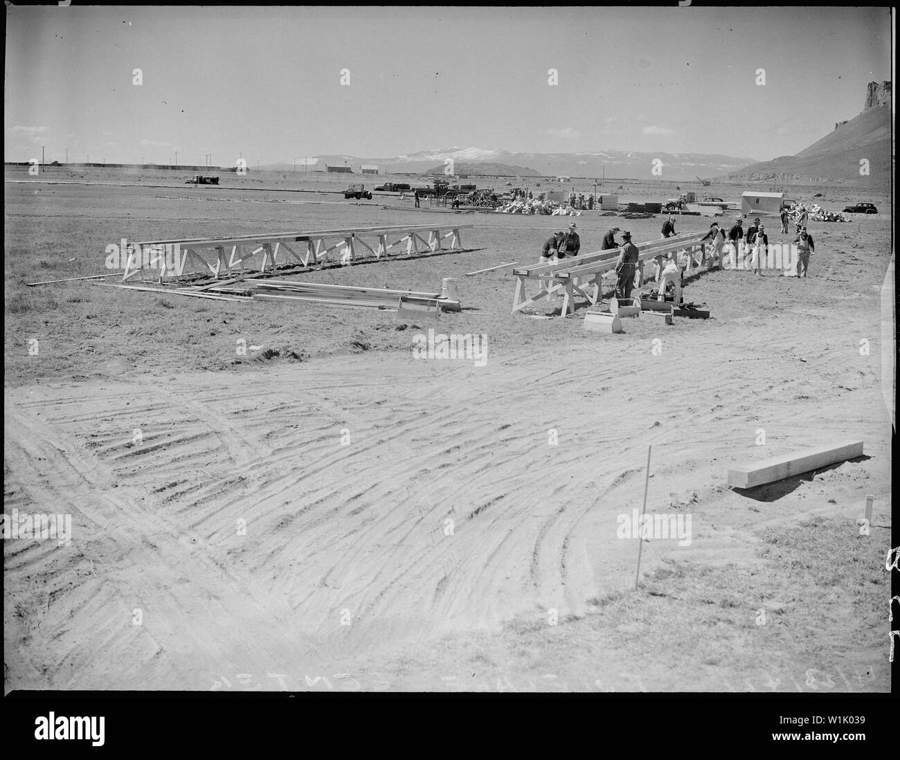 Tule Lake Relocation Center, Newell, California. Construction begins on a War Relocation Authority . . .; Scope and content:  The full caption for this photograph reads: Tule Lake Relocation Center, Newell, California. Construction begins on a War Relocation Authority center for evacuees of Japanese ancestry near Tule Lake in Modoc County, California, south of the Oregon border. Stock Photo