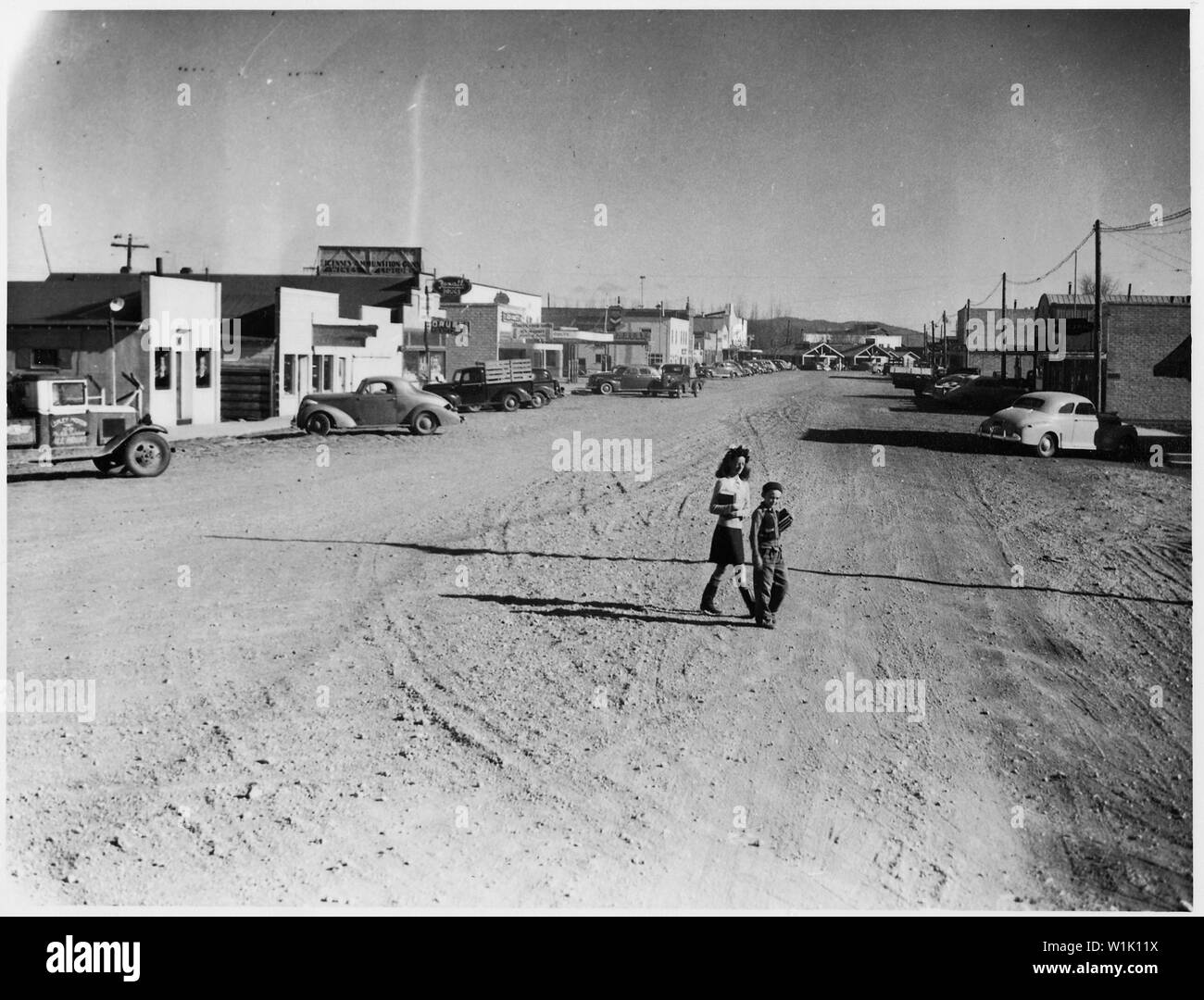 Tule Lake Relocation Center, Newell, California. Looking east on main street of Tule Lake, Californ . . .; Scope and content:  The full caption for this photograph reads: Tule Lake Relocation Center, Newell, California. Looking east on main street of Tule Lake, California. Near this town, in Modoc County, California, south of the Oregon border, will be established a War Relocation Authority center for evacuees of Japanese ancestry. Stock Photo