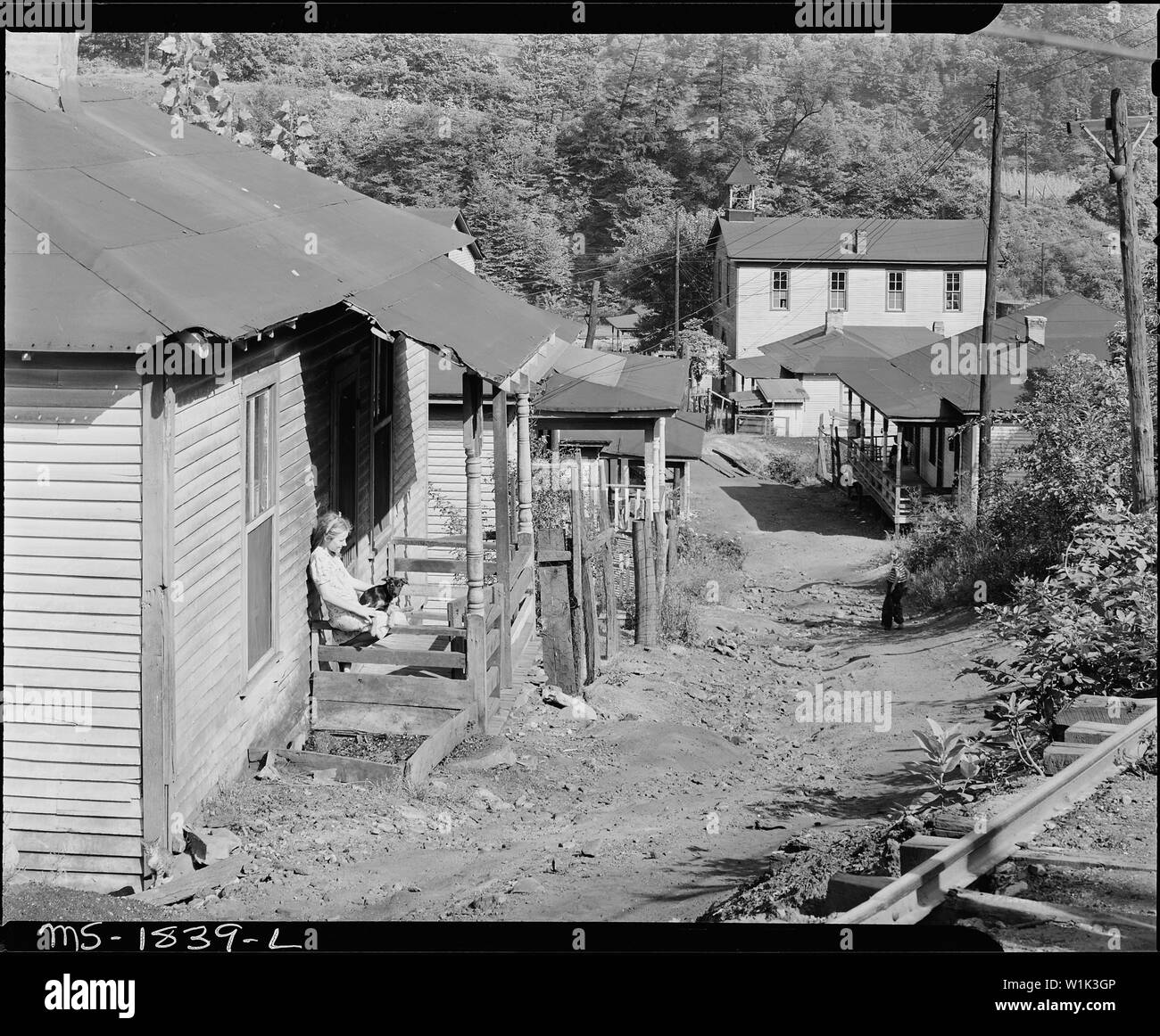 Typical houses and street. Comment of a miner, These houses were here