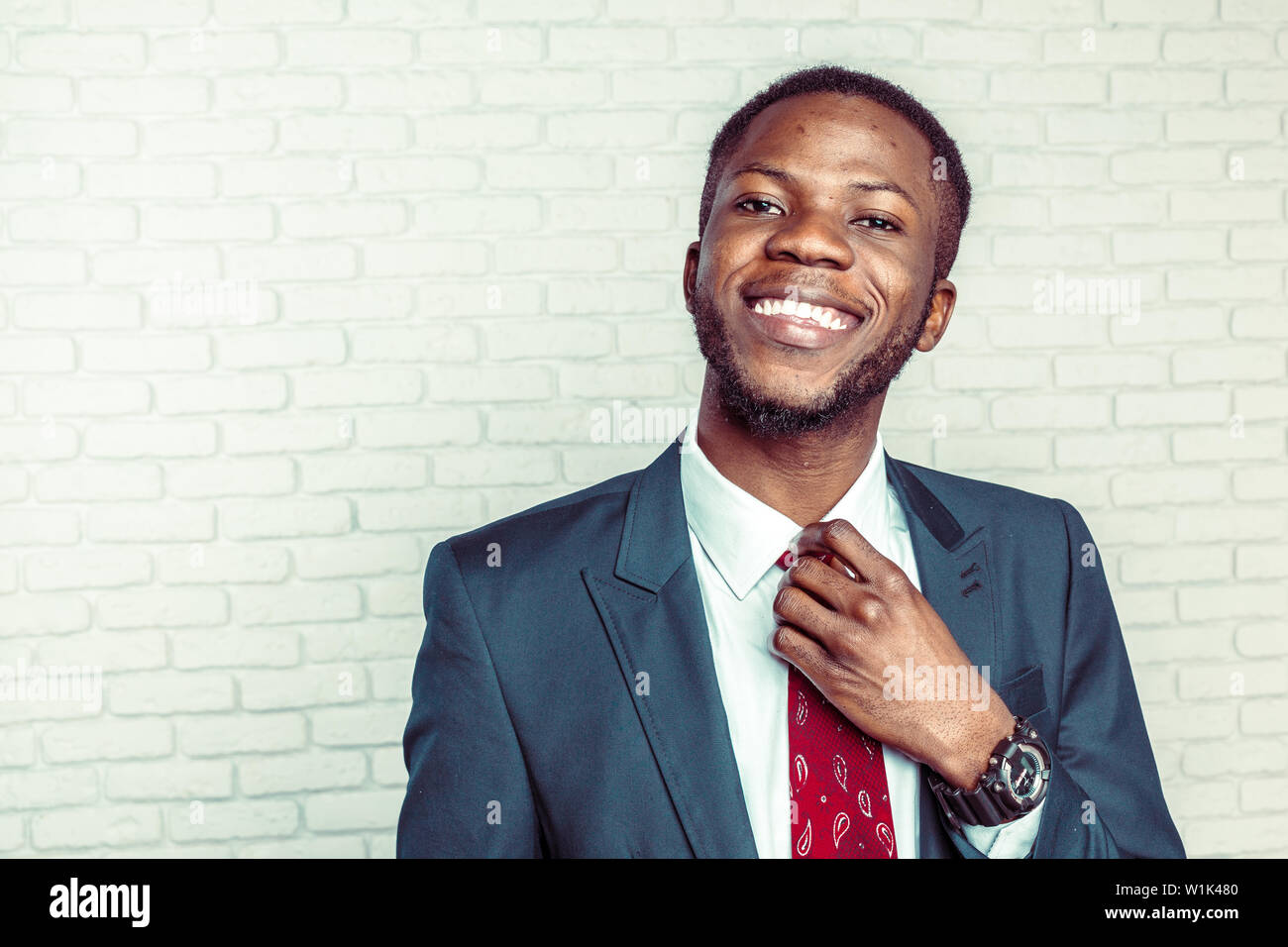 portrait of happy, smiling black business man Stock Photo - Alamy