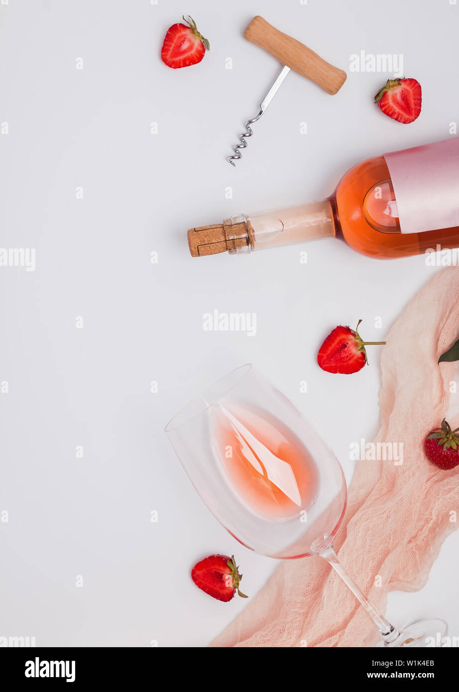 Creative composition with rose wine and strawberries, top view Stock