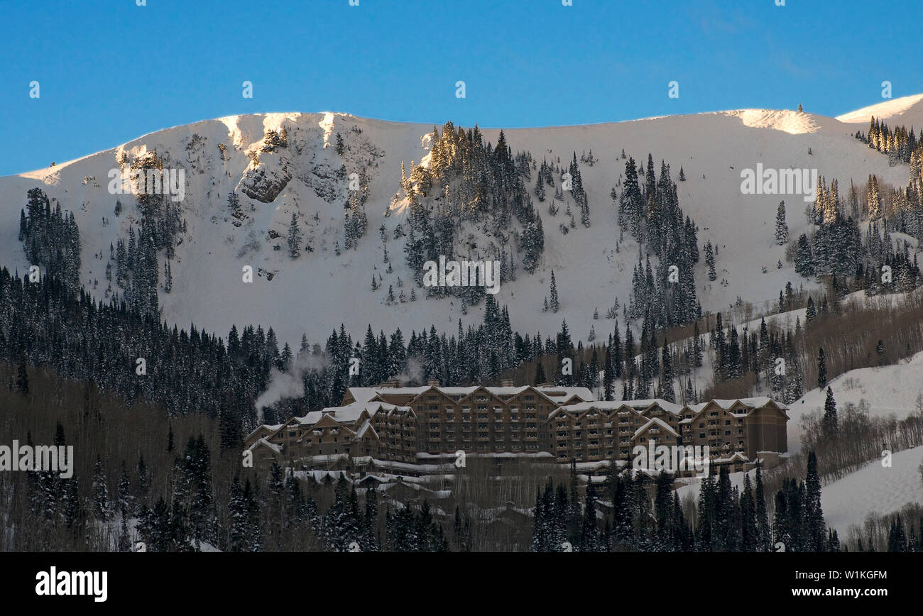 The sun rises over Empire Canyon at Deer Valley Resort, with the Montage resort in the foreground. (c) 2010 Tom Kelly Stock Photo