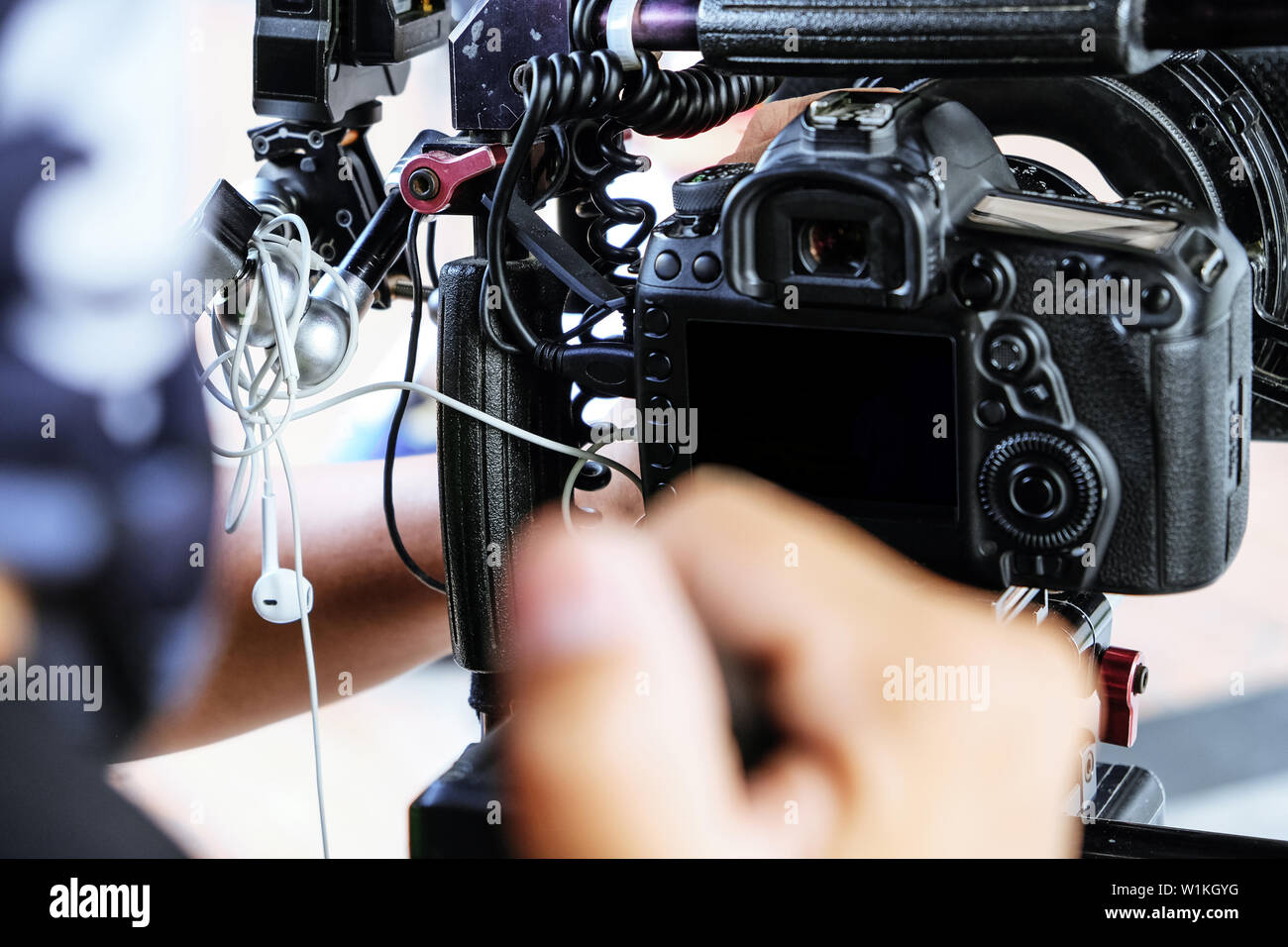 Filming with professional camera background Stock Photo - Alamy