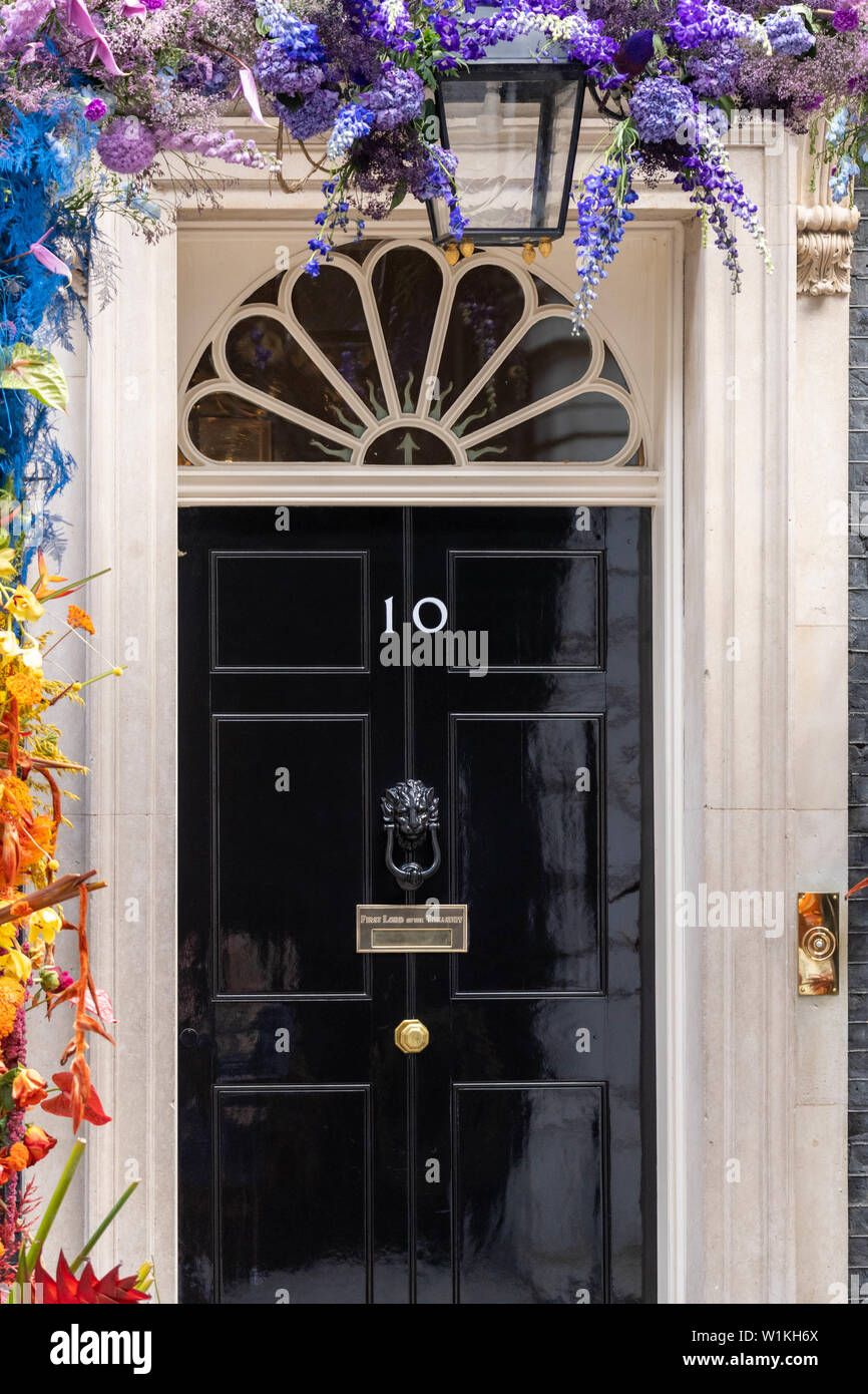 London, UK. 3rd July 2019.  Front door of 10 Downing Street, London  with LGBT flower display Credit Ian Davidson/Alamy Live News Stock Photo