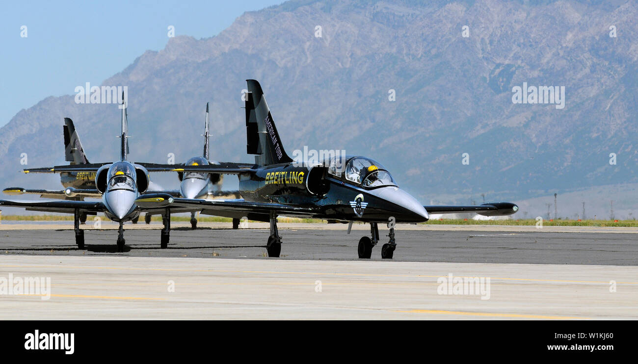 The Breitling Jet Team taxis its L-39 Albatros aircraft to an active runway during the Warriors Over the Wasatch air show at Hill Air Force base near Stock Photo