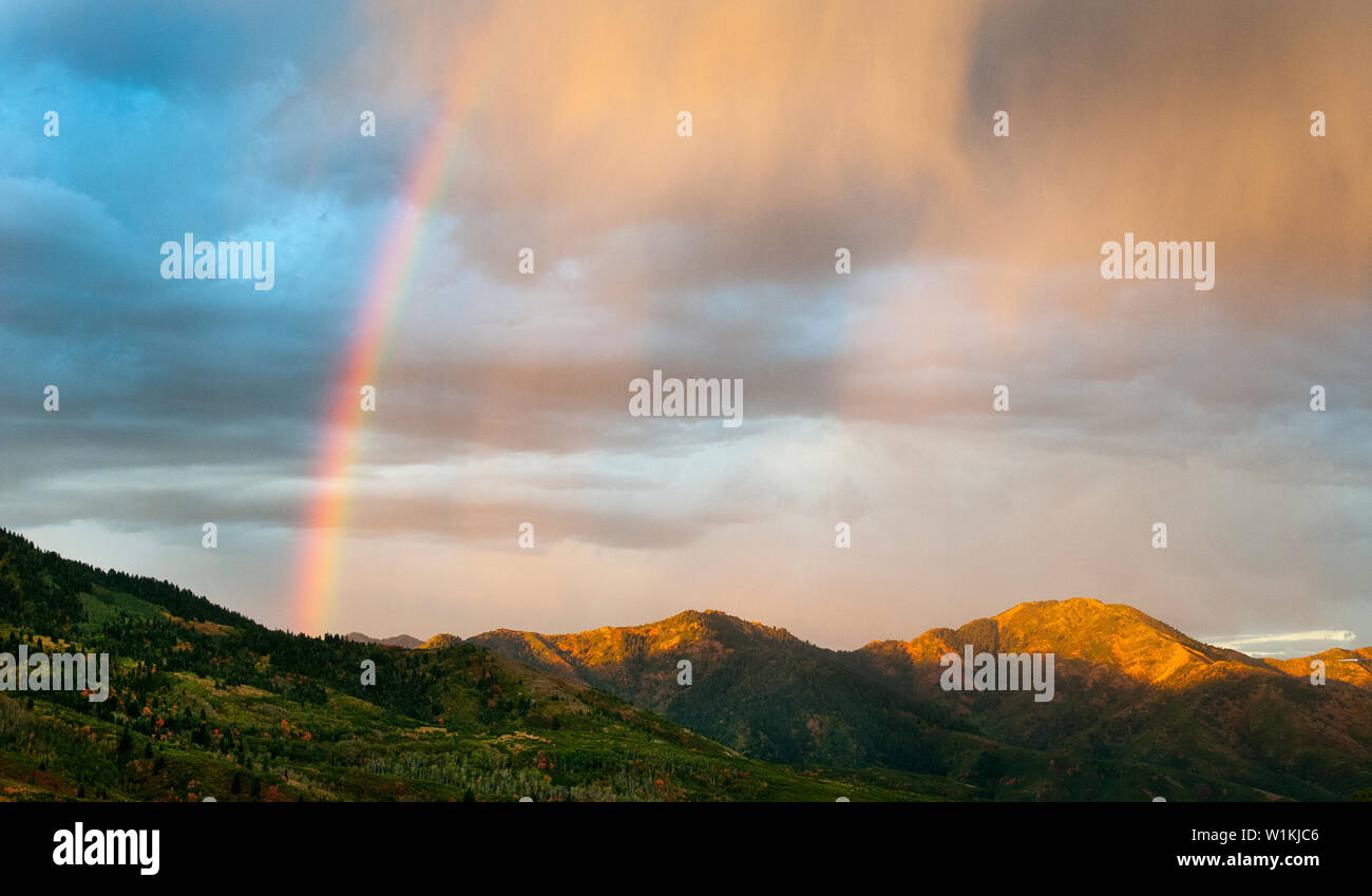A Rainbow Shoots Skyward As Storms Pass Over Mt Aire In Parley S Canyon Outside Salt Lake City Utah C 16 Tom Kelly Stock Photo Alamy