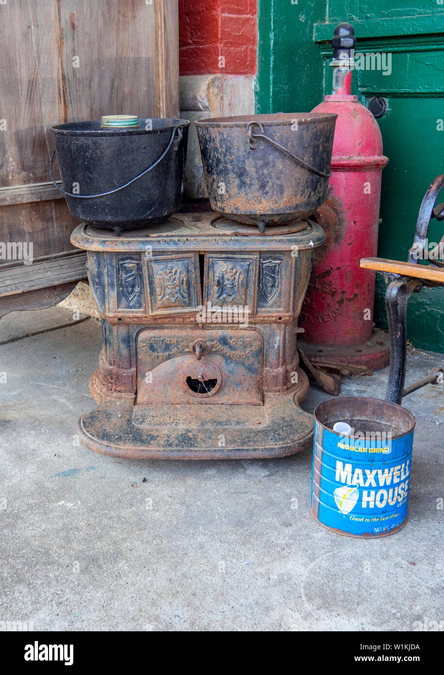 Cast iron pots on a wood fired stove in an antique shop in Paducah Kentucky USA. Stock Photo