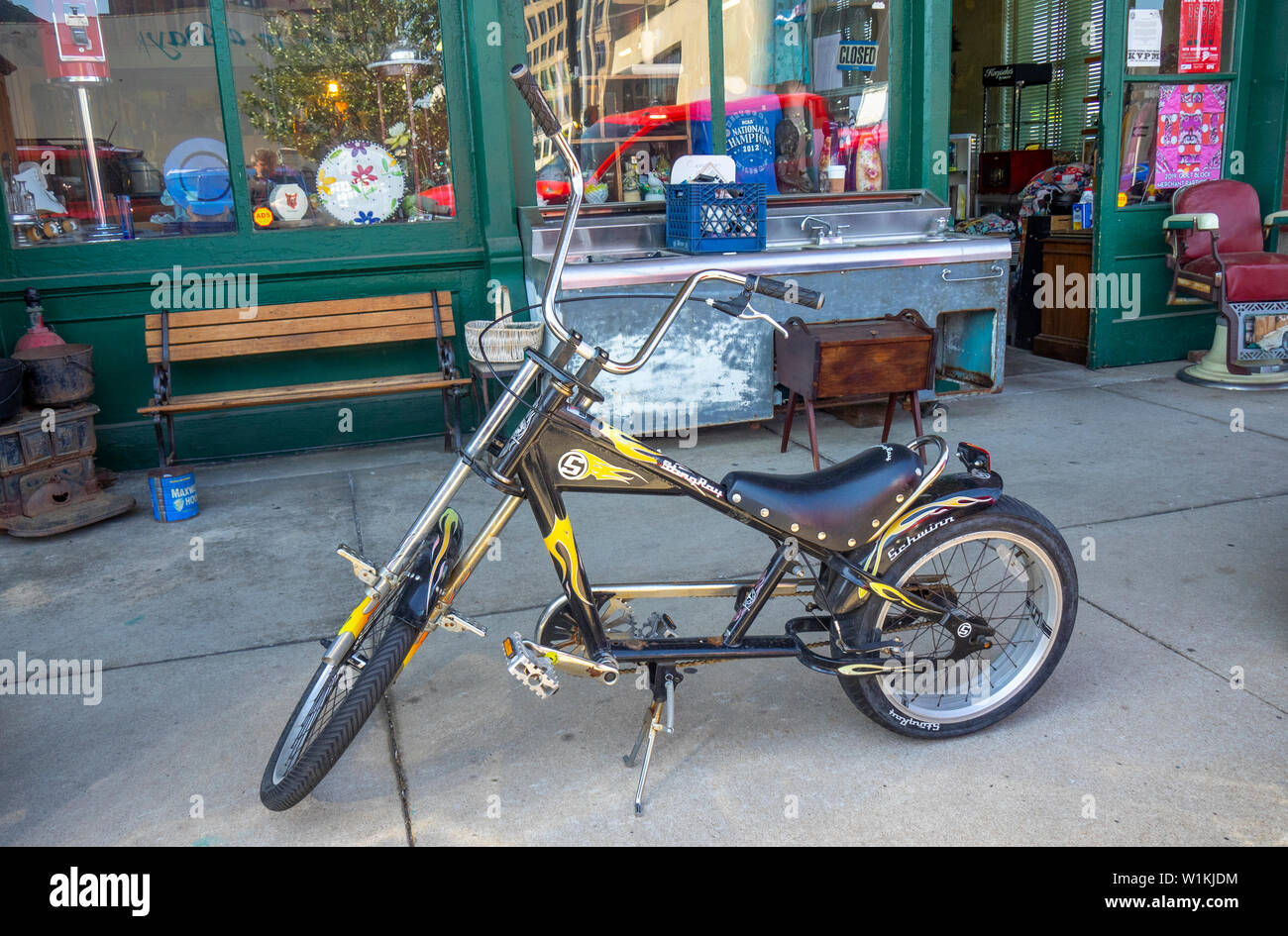 Vintage BMX bicycle on the pavement outside the Courtyard Antiques shop Paducah Kentucky USA. Stock Photo