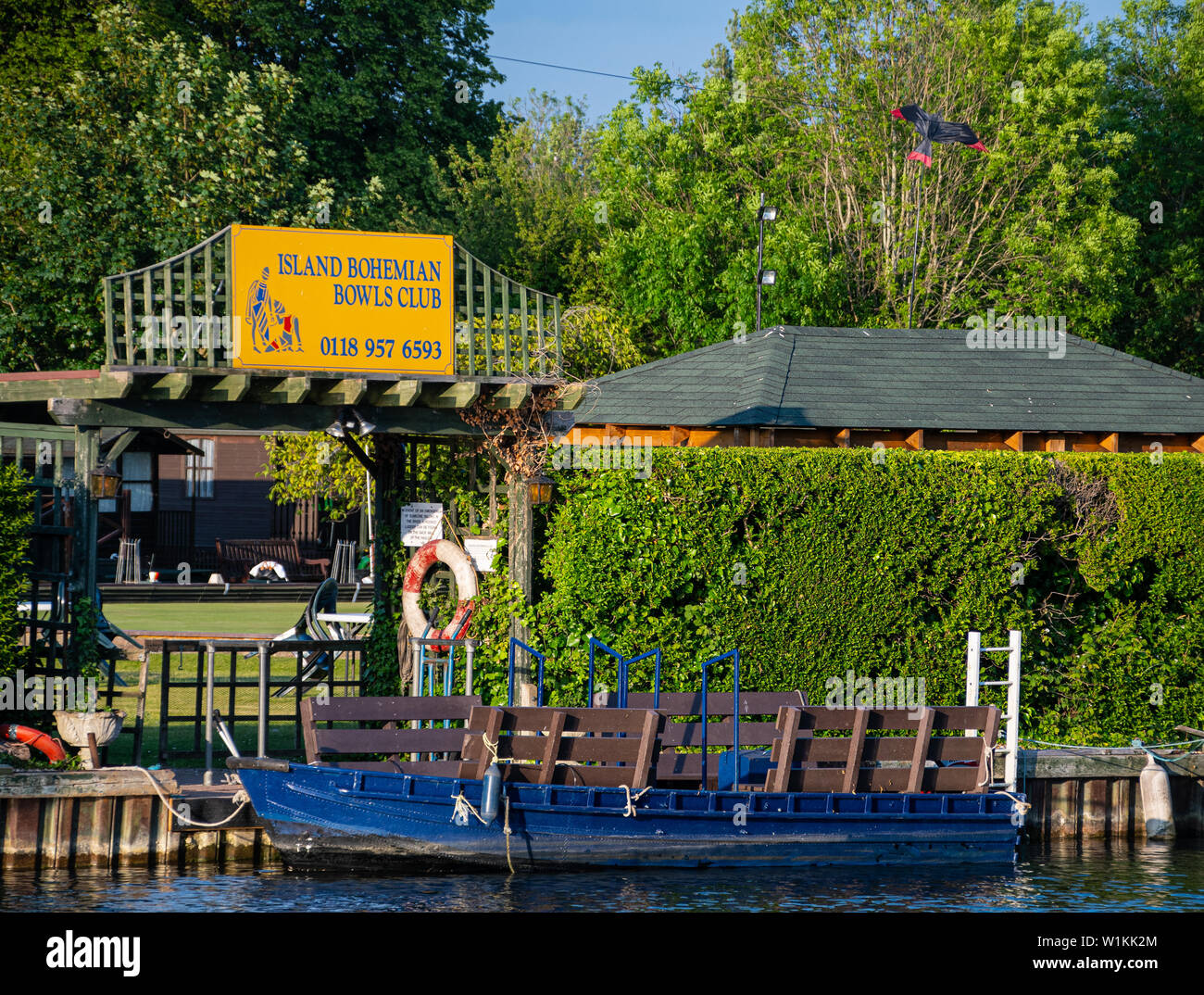 Reading, United Kingdom - May 24 2019:   The sign above the entrance to the Island Bohemian Bowls Club on a small island in the middle of the River Th Stock Photo