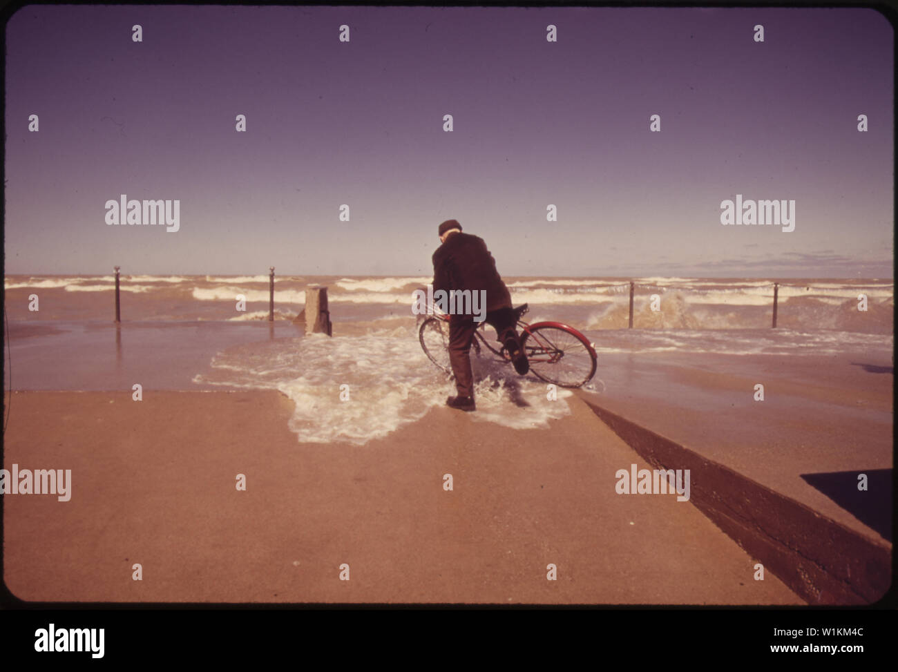 Wave Rider Crash WAVE CRASHES OVER SEAWALL, TAKING AN ELDERLY BICYCLE RIDER BY SURPRISE ...