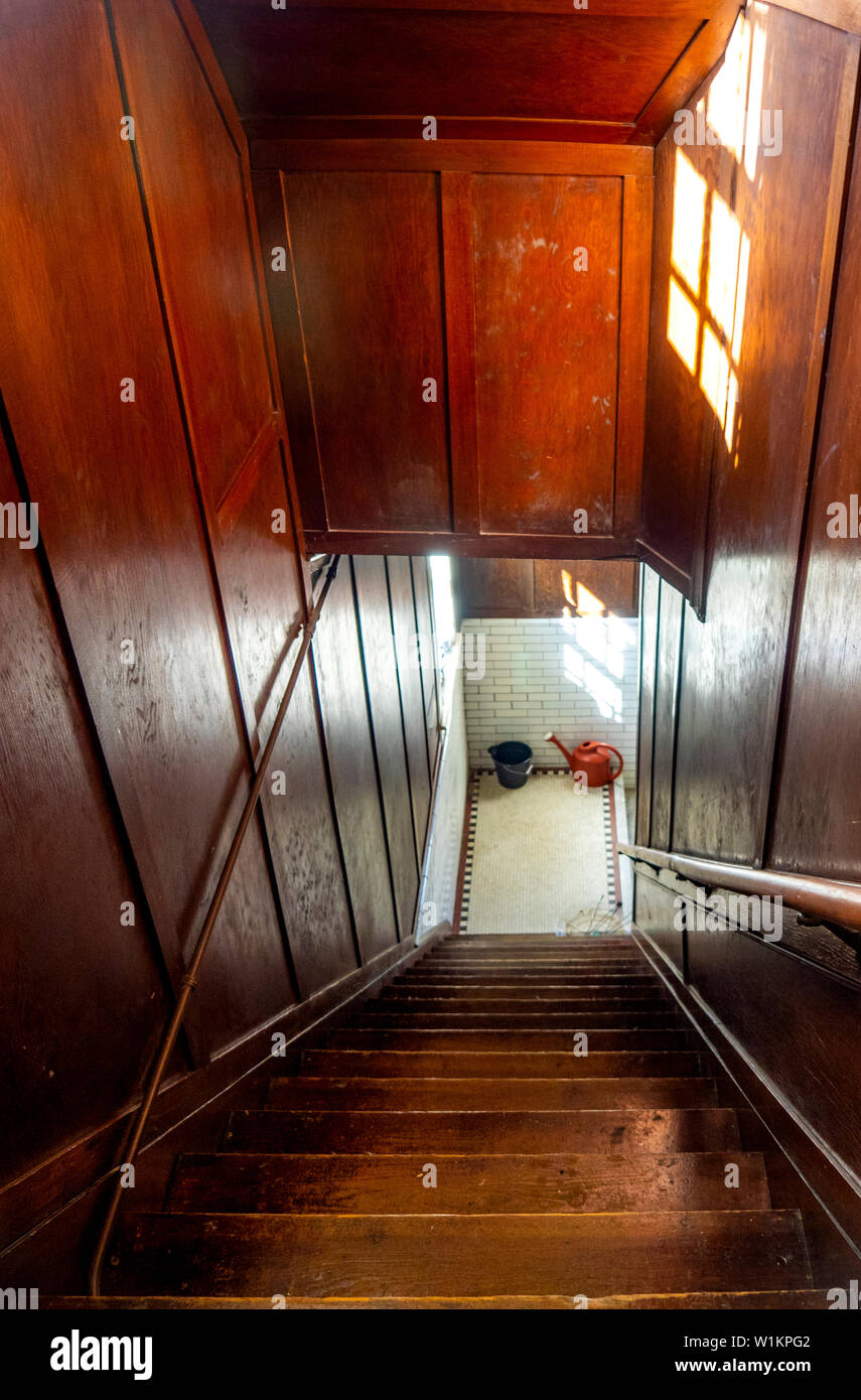 Wooden staircase leading to basement of historic AndersonSmith House