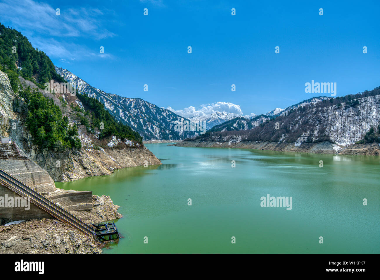 Kurobe Emerald Green Lake and Kurobe Dam Japan Stock Photo