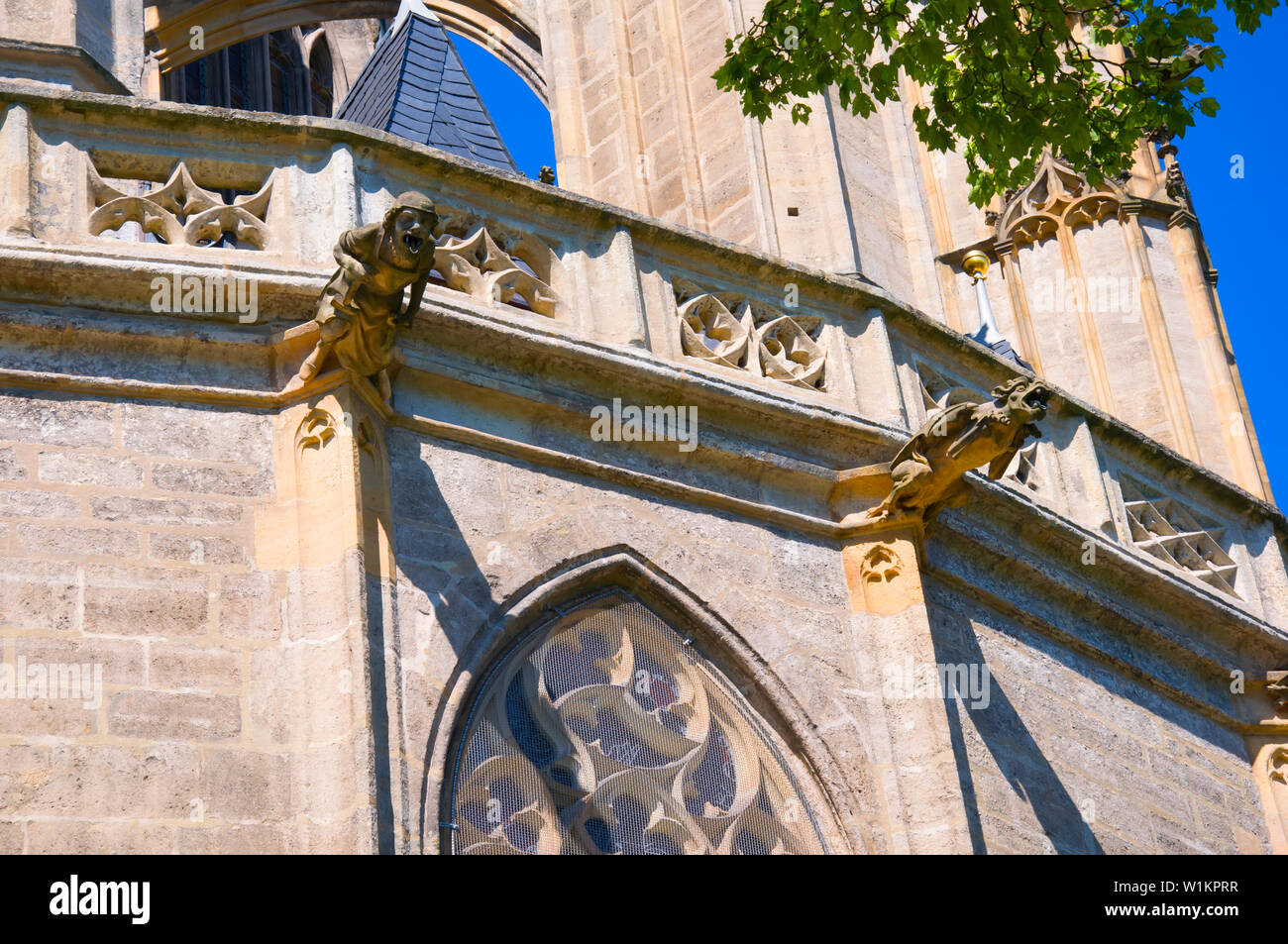 Two stone gargoyles on the facade of the St. Barbara Cathedral, Kutna Hora, Czech Republic Stock Photo