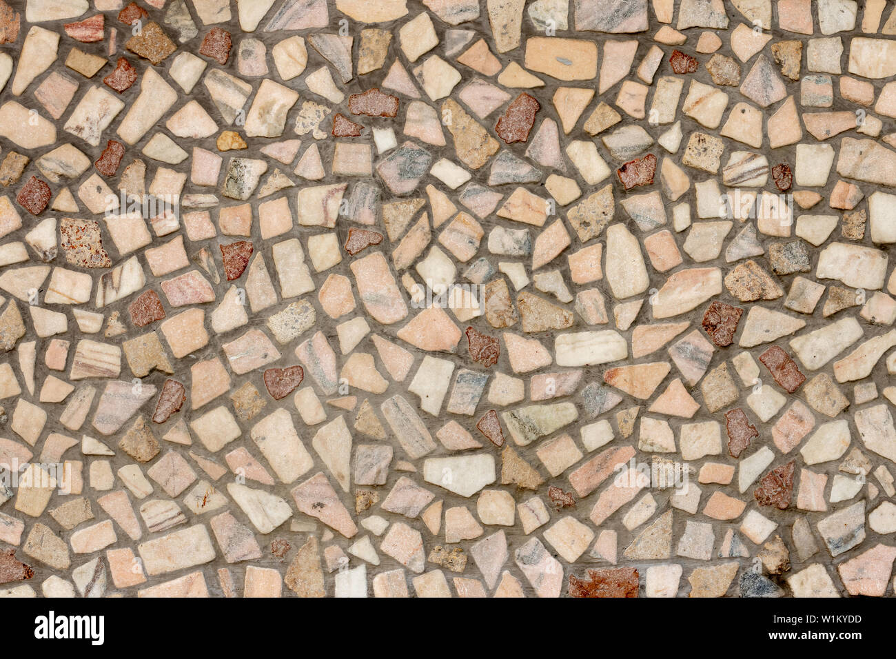 Description pieces of granite stone in concrete, texture Stock Photo