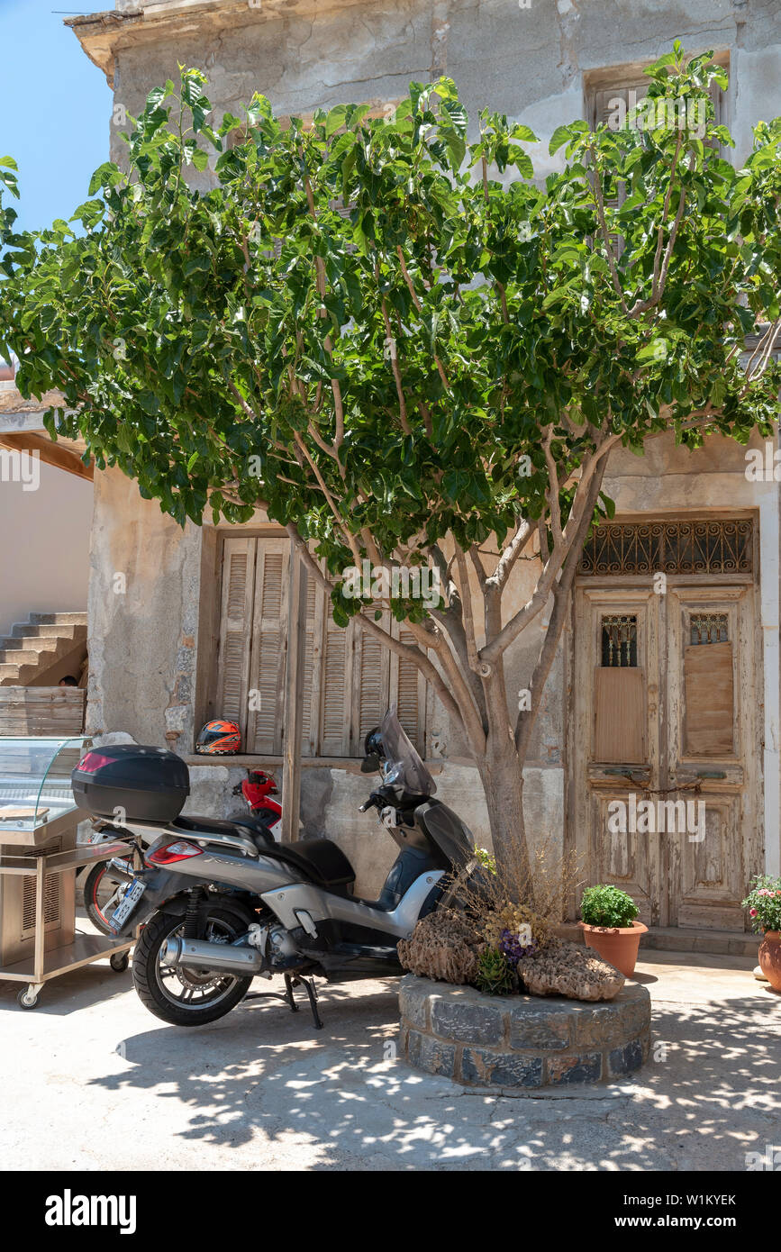 Plaka, Crete, Greece. June 2019. The old doctor's house in the Cretan village of Plaka. The house faces Spinalonga a former leper colony. Stock Photo