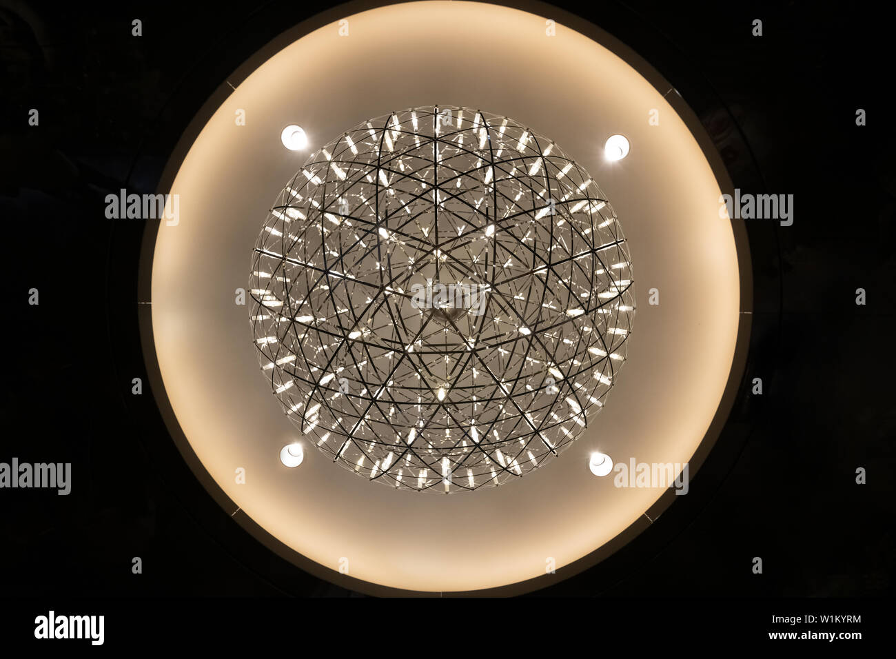 description: Led chandelier in the form of a sphere on the background of a white round ceiling Stock Photo