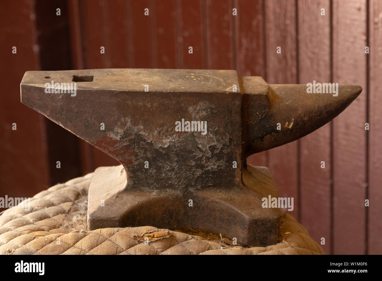 description: Anvil and horseshoes on an altarpiece in the neighborhood of Parelheiros, south zone of Sao Paulo, SP. Stock Photo