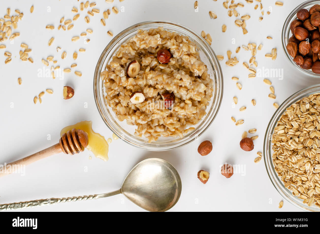 Healthy Lifestyle Eating Concept Balanced Diet Food Menu For Breakfast Oats Porridge Bowl With Hazelnuts And Honey On White Background Overhead Sho Stock Photo Alamy