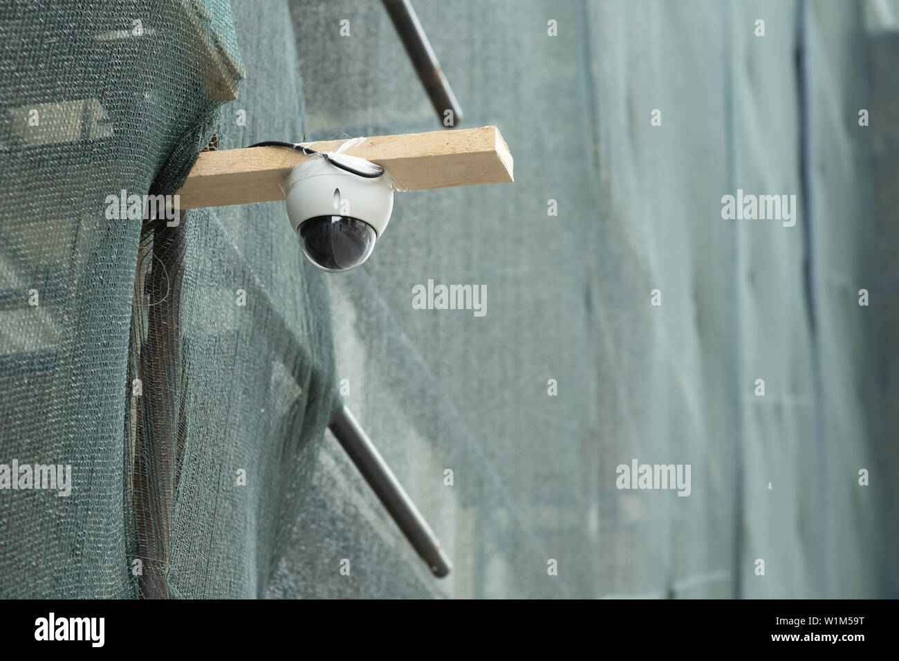 description: CCTV Camera Operating in construction site Stock Photo