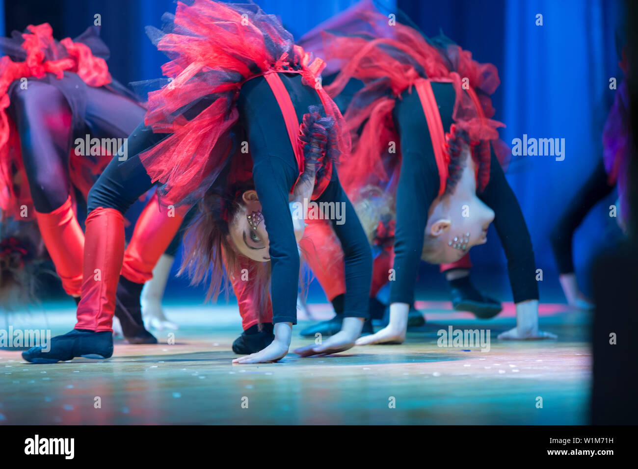 Indicative training circus school.Little girls perform a dance number